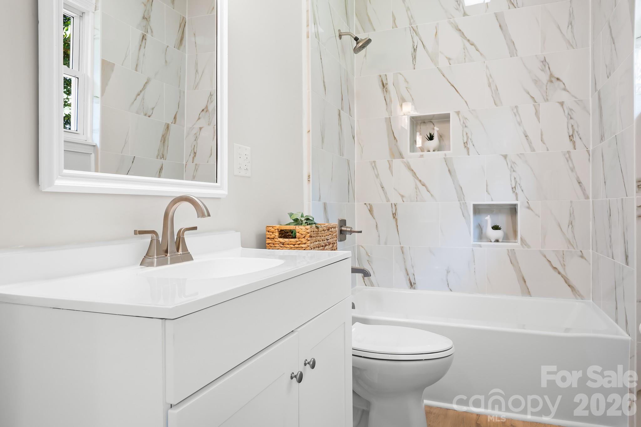Tub/shower combo with matching brushed nickel hardware - 104 1st Avenue, China Grove