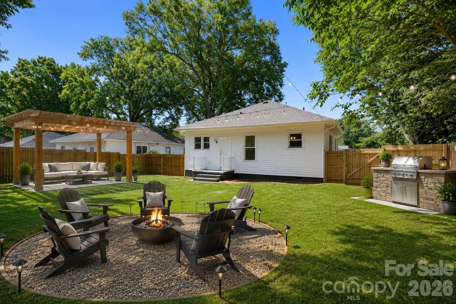 Spacious, fully fenced backyard offering privacy and plenty of possibilities. Virtually staged - 104 1st Avenue, China Grove