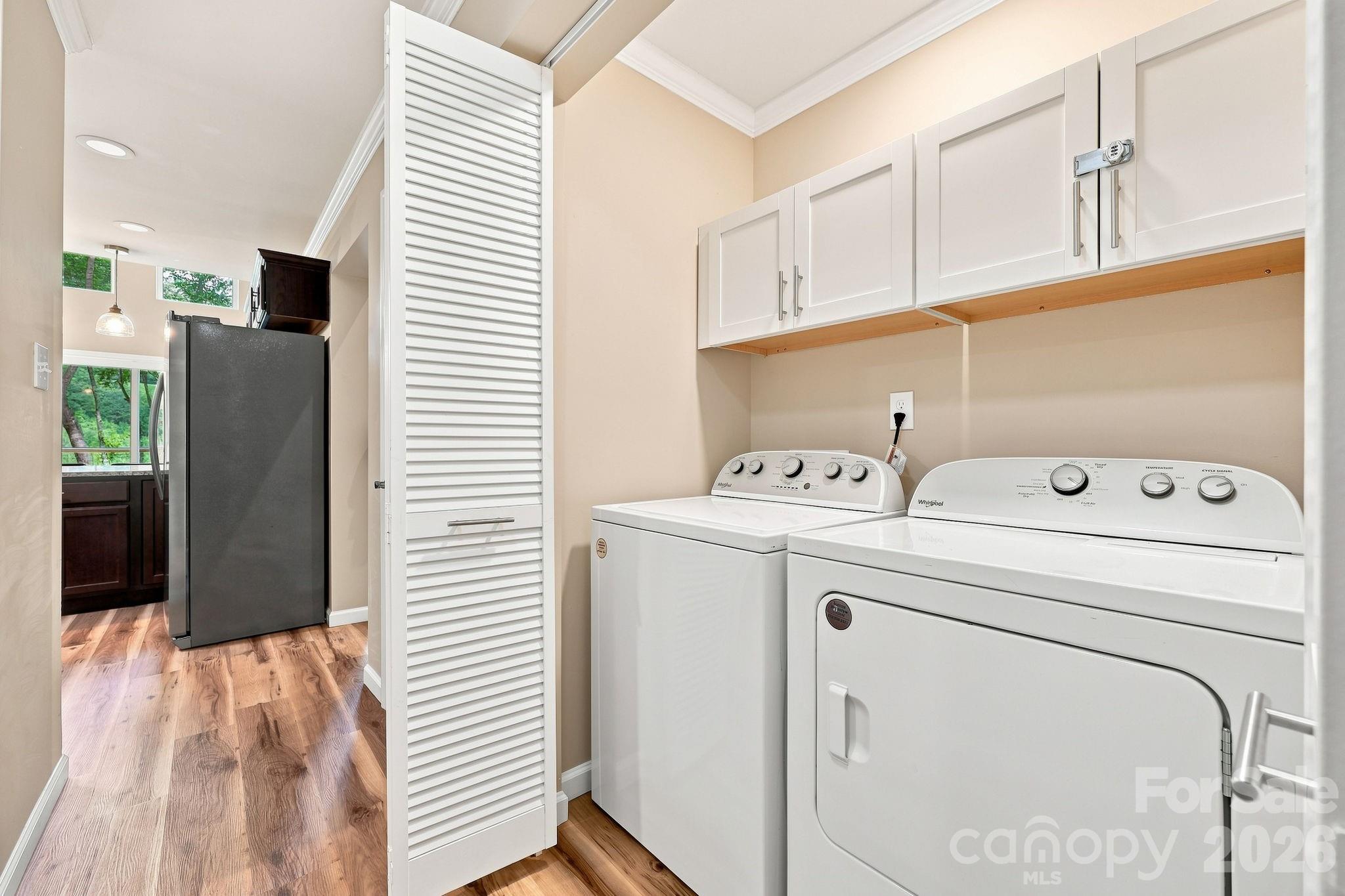 Laundry room in hallway - 145 Banjo Lane, Waynesville