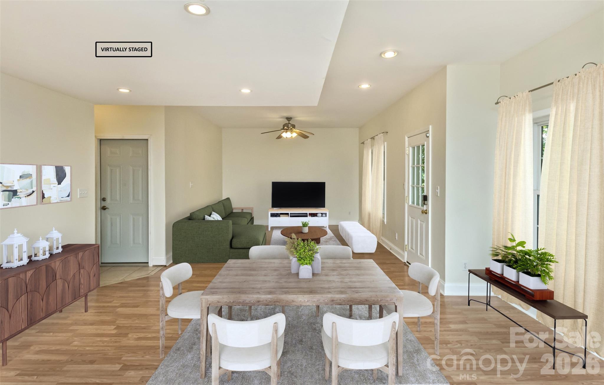Virtually staged to show it as a living area and dining area to the left - 113 Ballantree Drive, Asheville