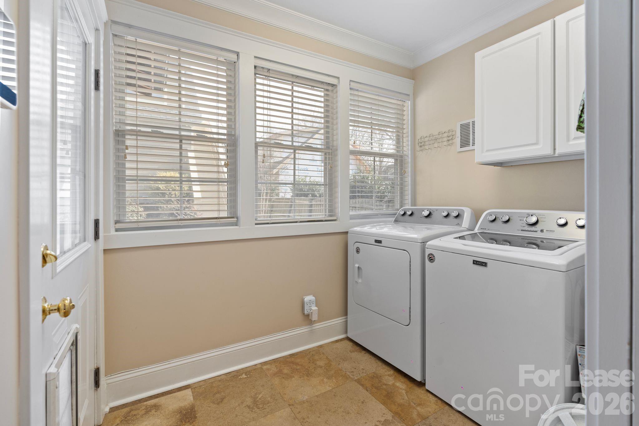 Laundry room off kitchen - 425 Tremont Avenue E, Charlotte