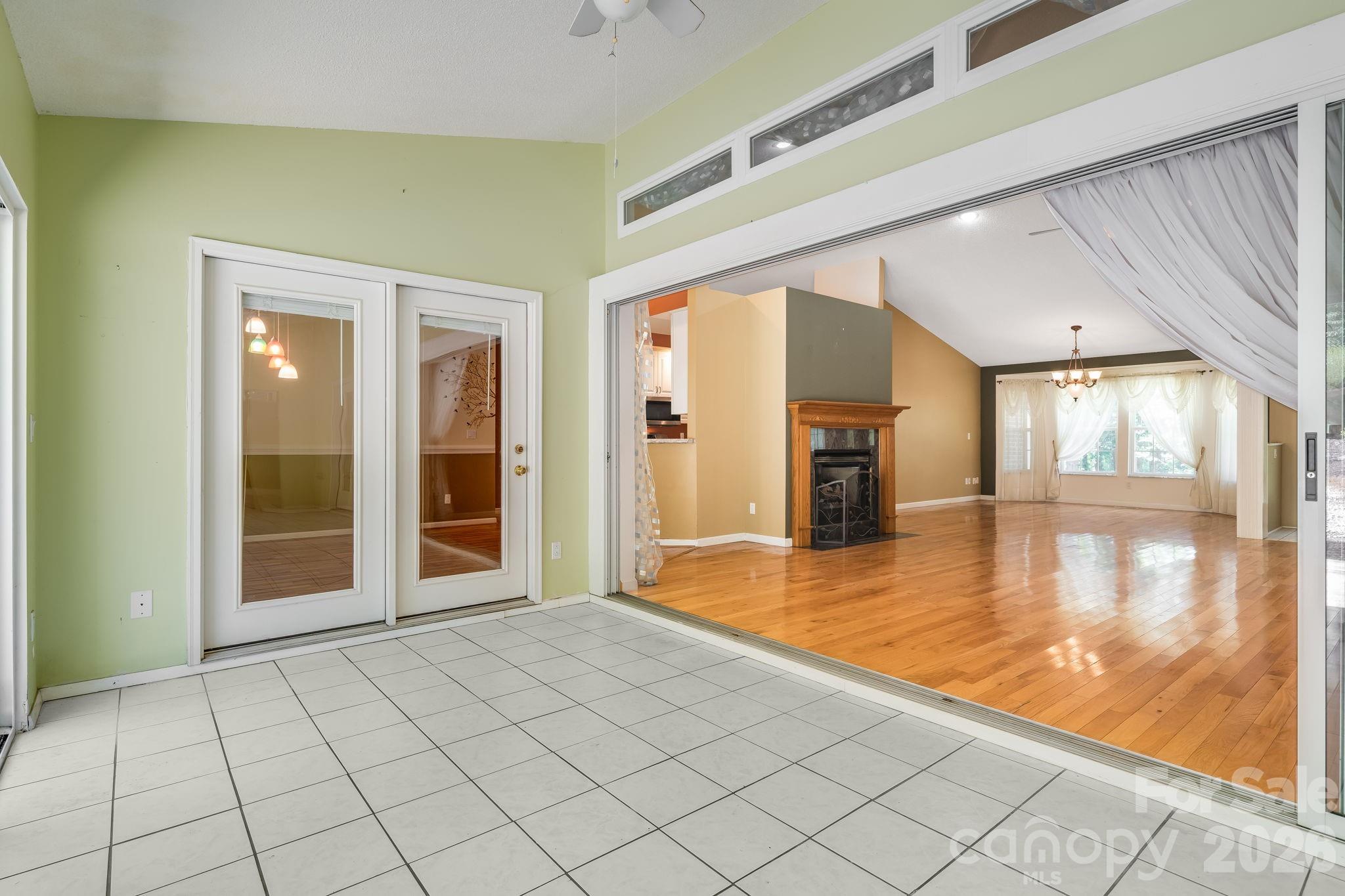 Triple Sliders FULLY open to Sunroom - 225 Arbor Lane, Hendersonville