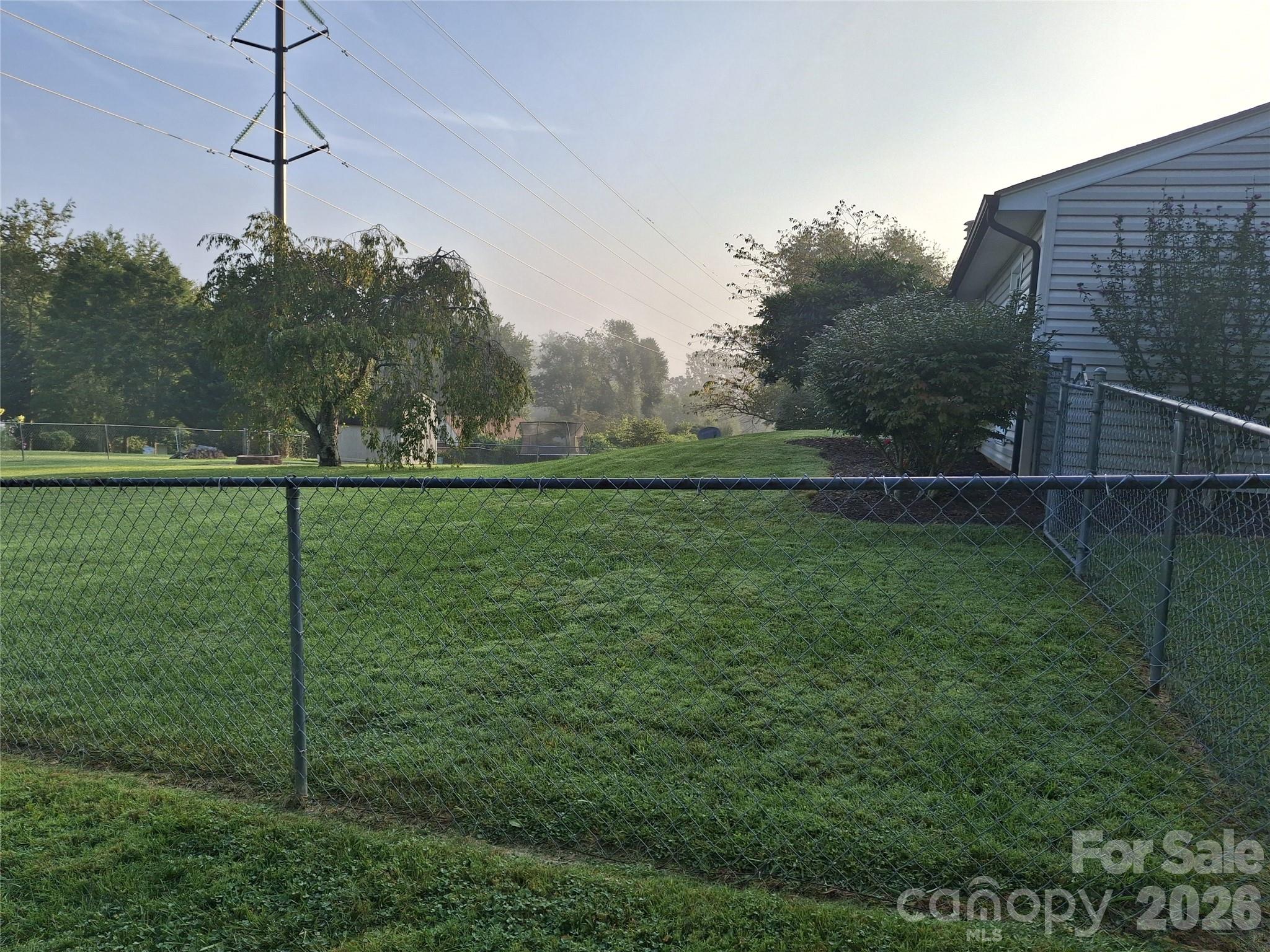 Well Maintained back yard completely fenced . - 204 Scottlynn Drive, Asheville