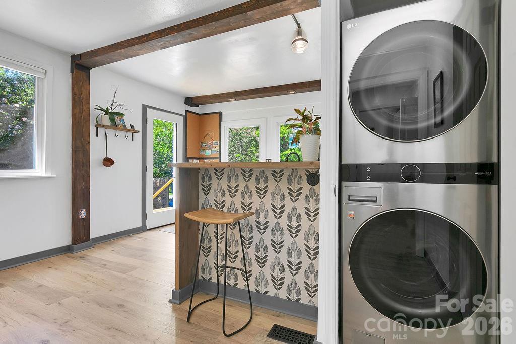 Breakfast bar and Laundry Closet with Door Open - 354 King Road, Pisgah Forest