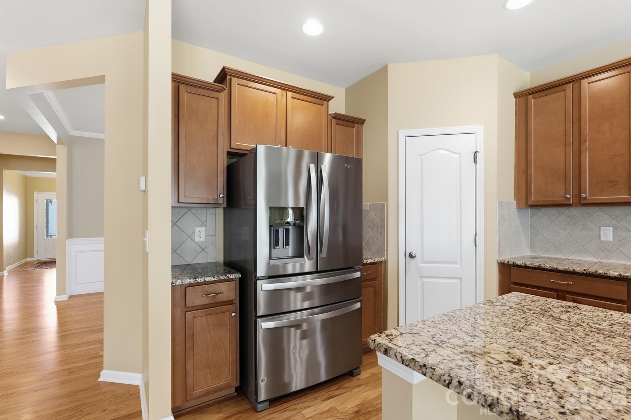 Spacious kitchen with large island, abundant cabinets and updated appliances - 4043 Perth Road, Indian Land