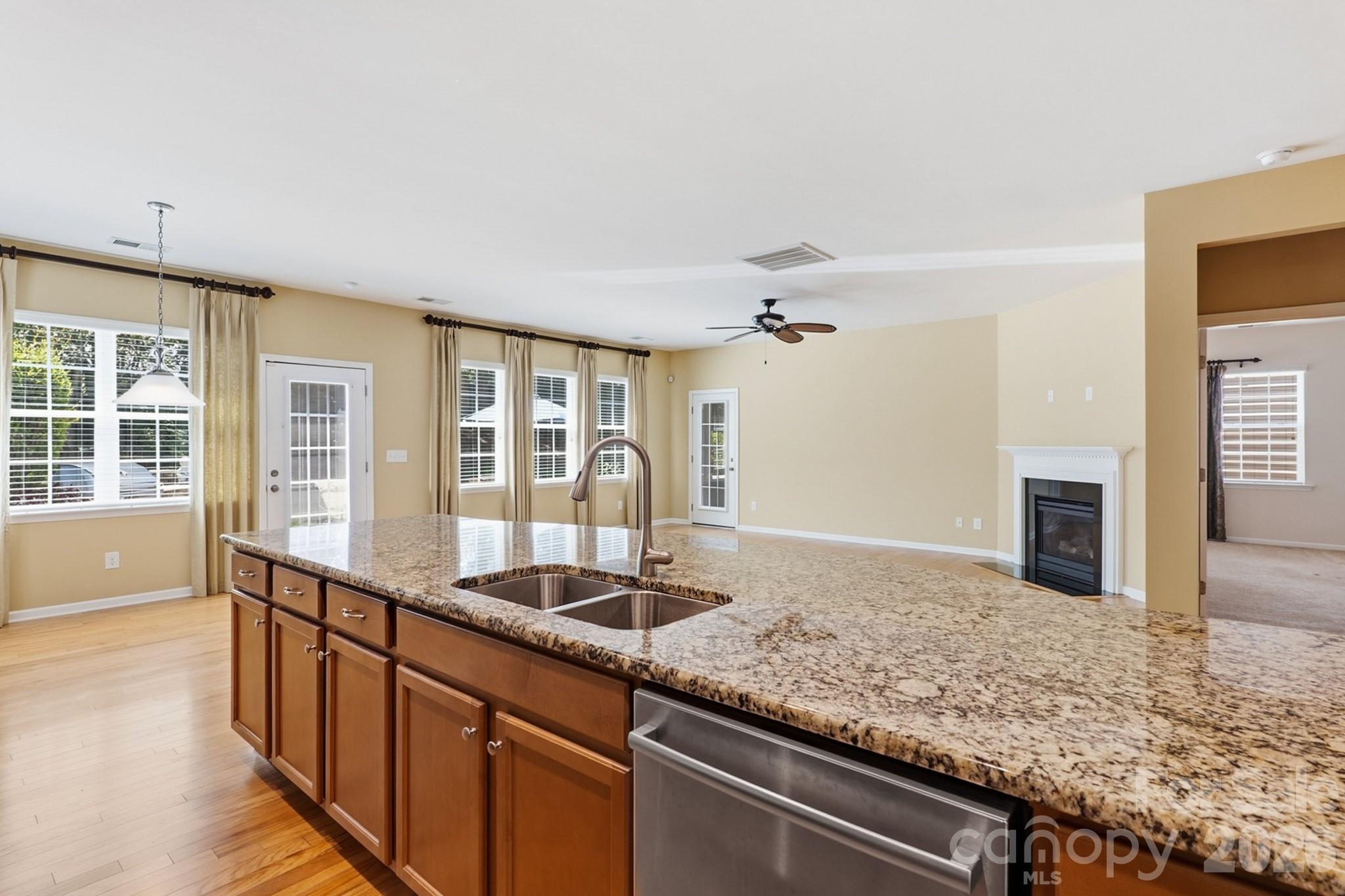 Spacious kitchen with large island, abundant cabinets and updated appliances - 4043 Perth Road, Indian Land