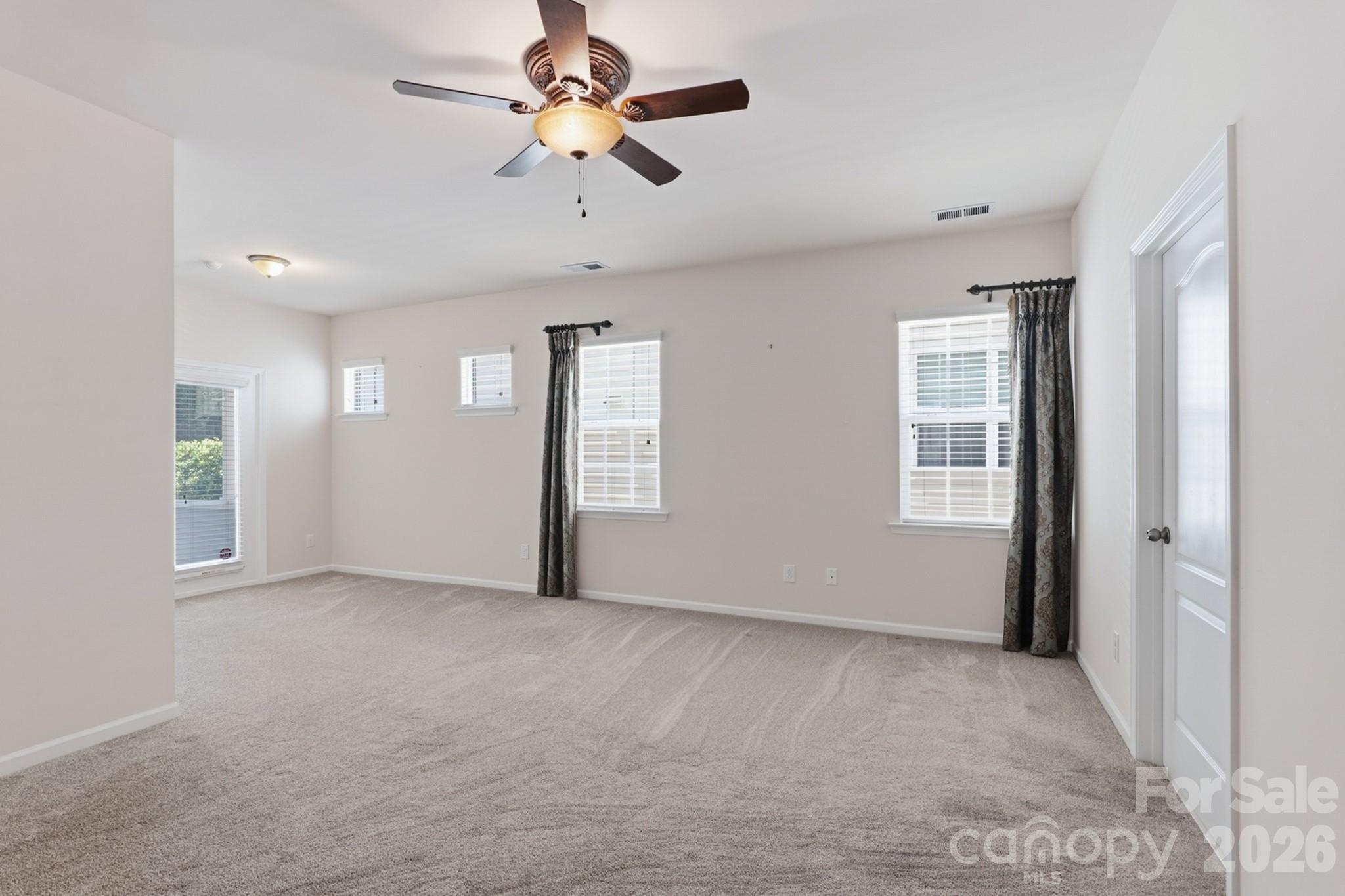 Primary bedroom with sitting area with direct access to the screened porch - 4043 Perth Road, Indian Land