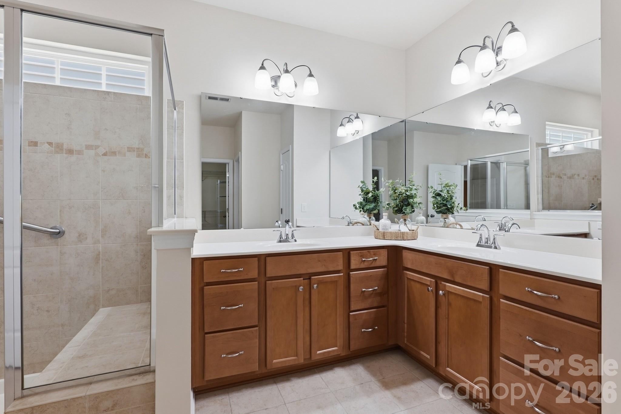 Primary ensuite bathroom with double sinks and abundant storage - 4043 Perth Road, Indian Land