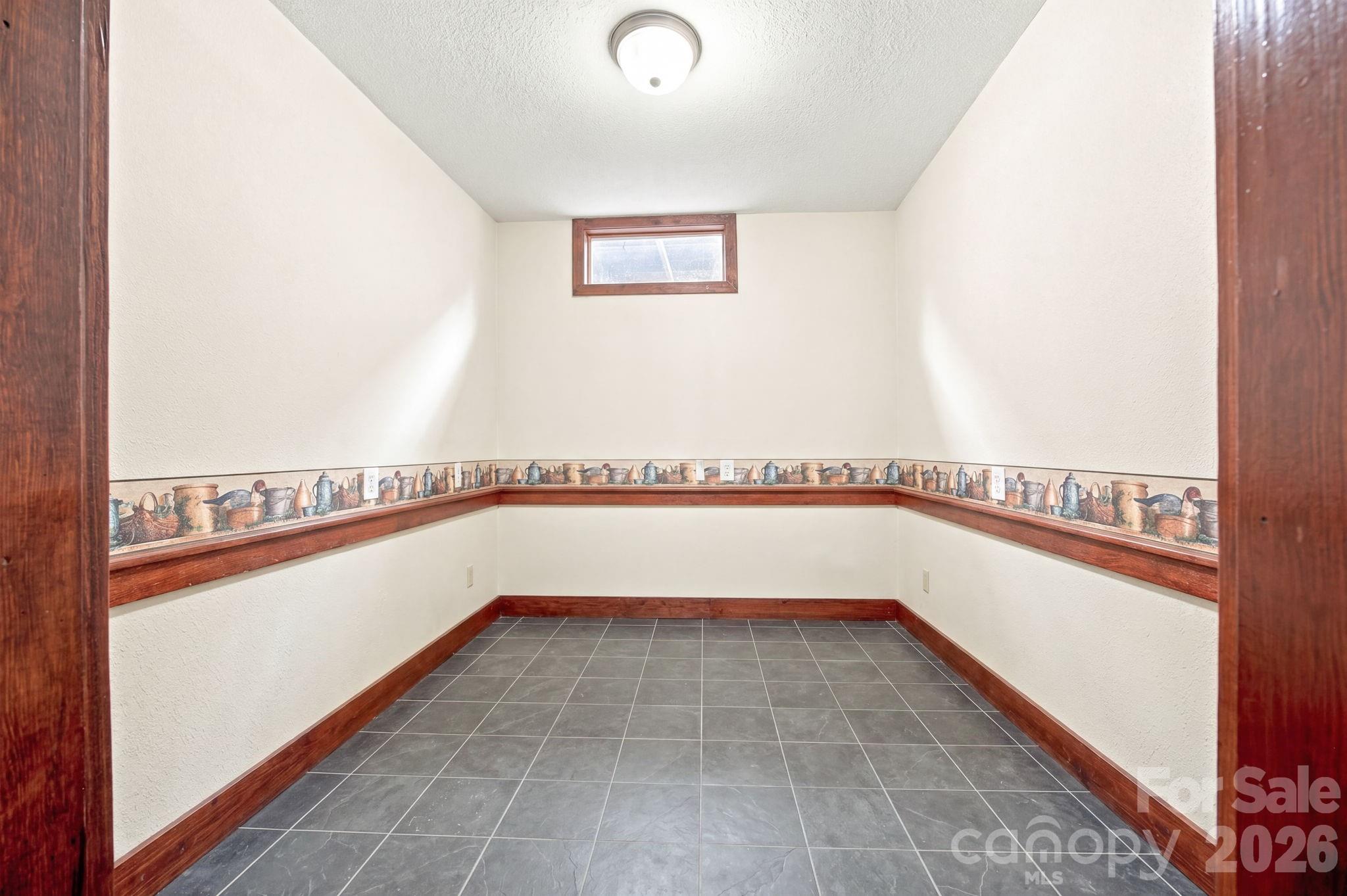 Photoshopped to remove items inside room - 305 Heritage Circle, Statesville
