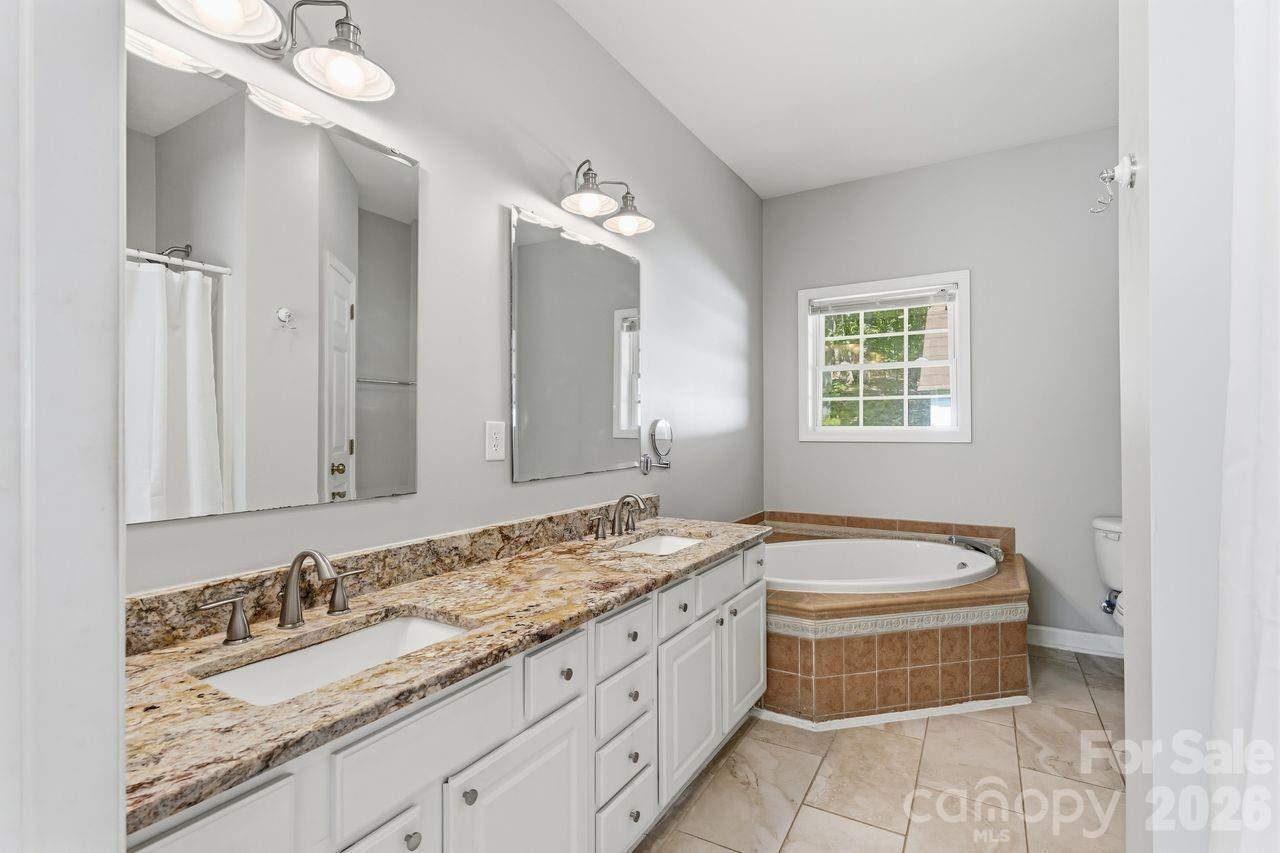 Primary Bath with double sinks, garden tub and granite tops - 5480 Liberty Hill Road W, York