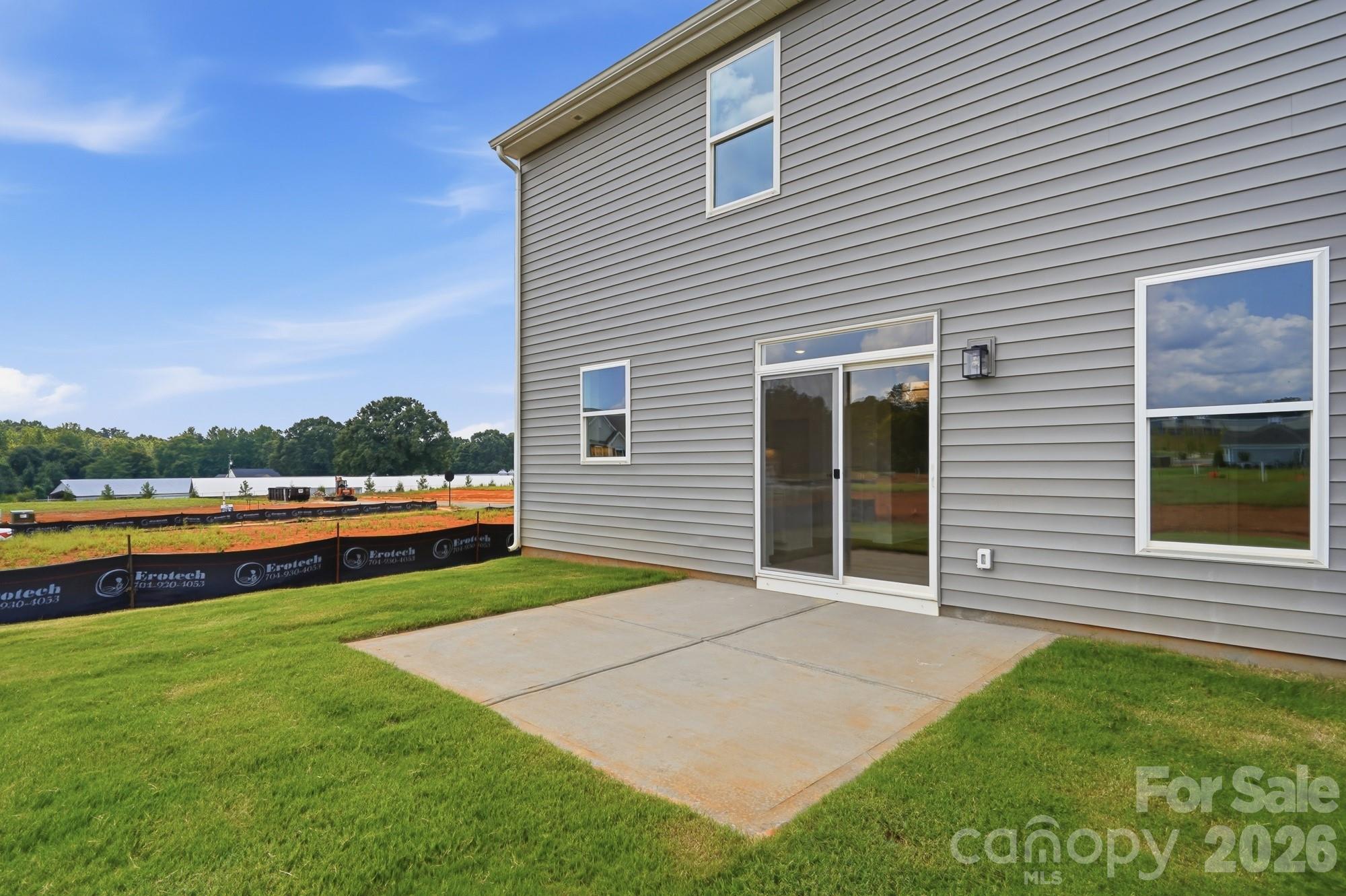 Patio and rear of home - 124 Swing Lane, Troutman