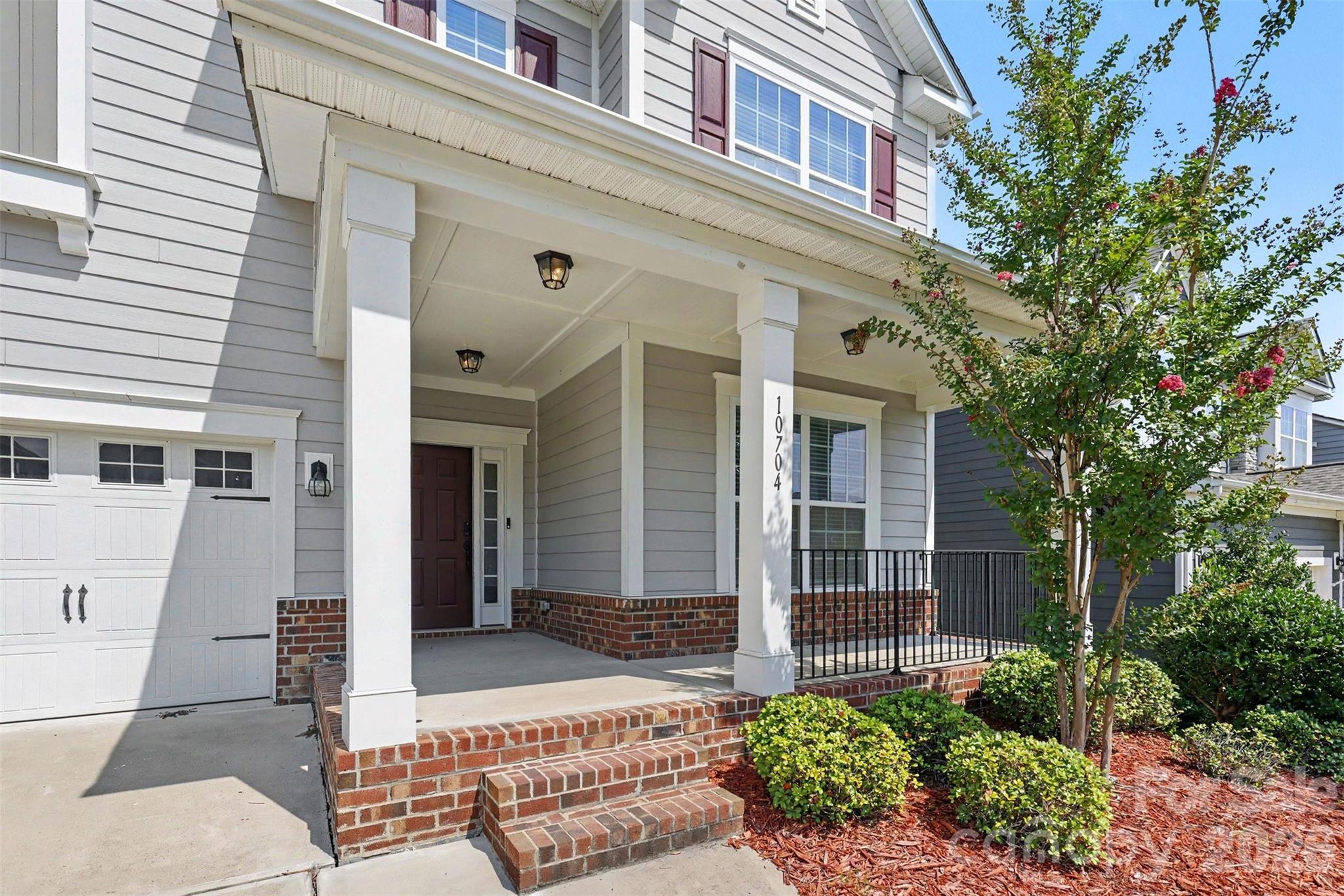 Single Family Residence at 10704 Sky Chase Avenue NW, Concord, photo 2 of 36