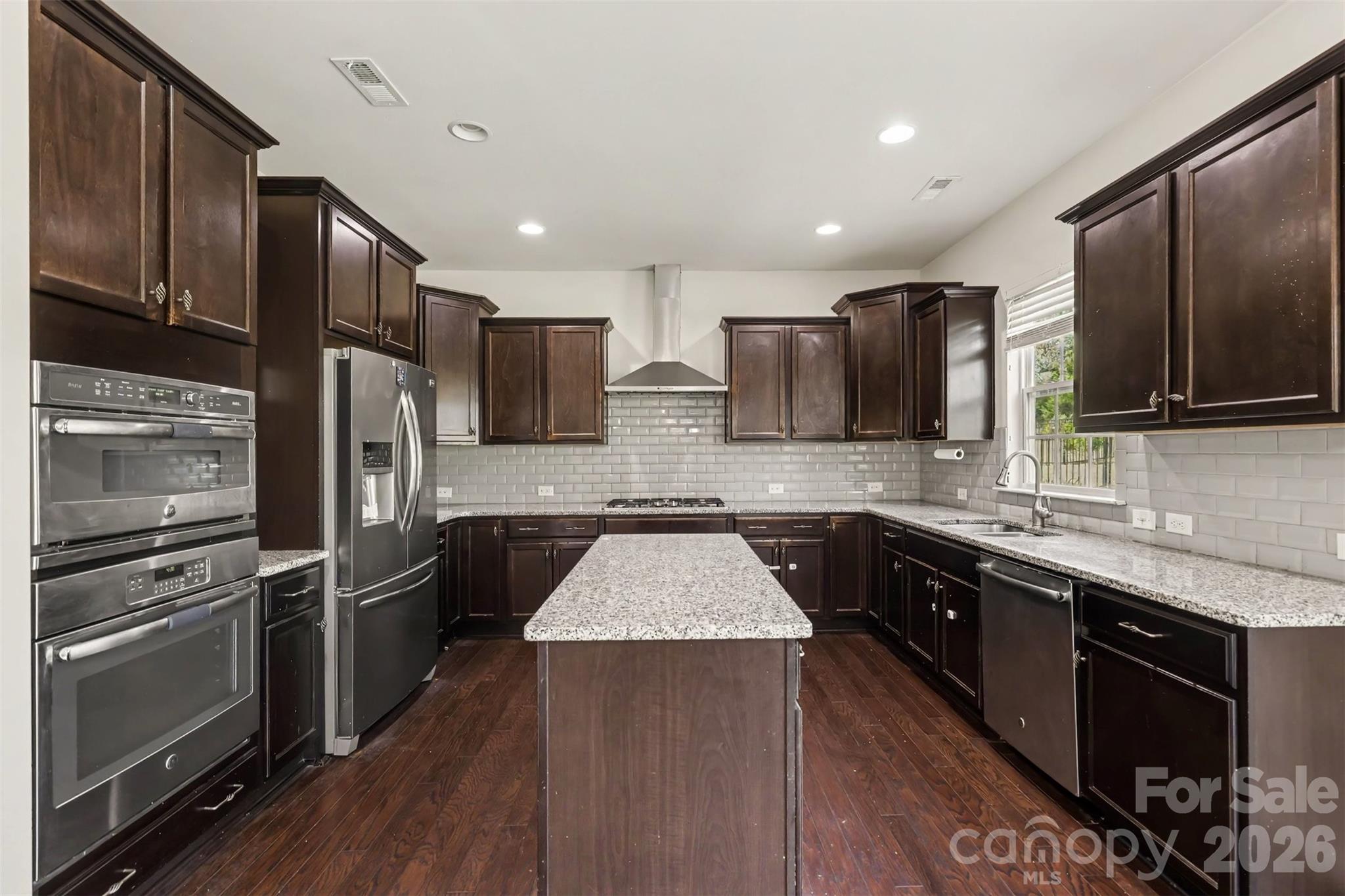 Single Family Residence at 10704 Sky Chase Avenue NW, Concord, photo 4 of 36