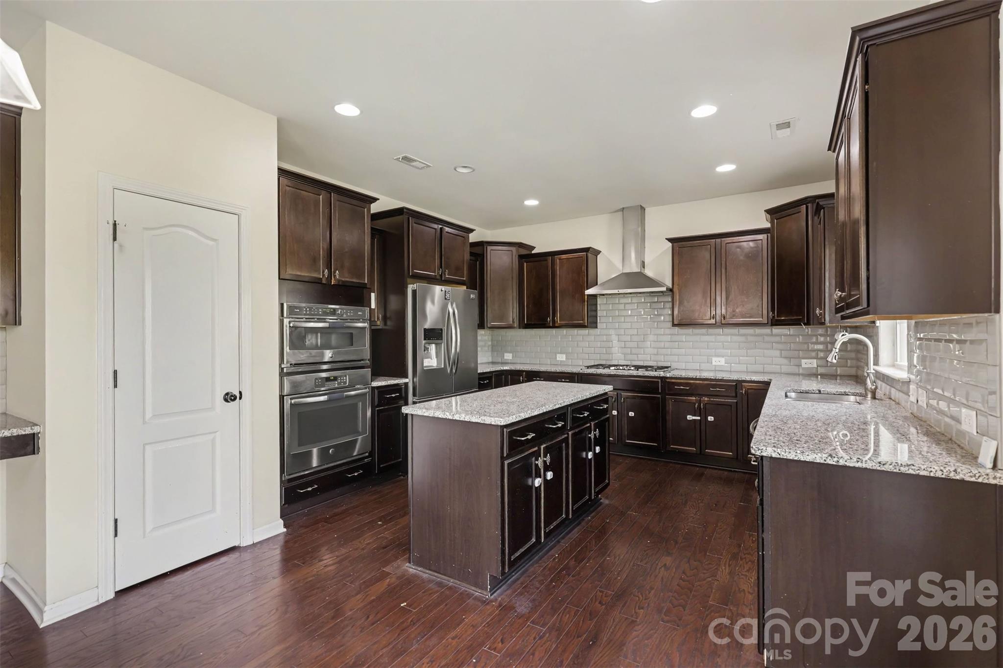 Single Family Residence at 10704 Sky Chase Avenue NW, Concord, photo 5 of 36