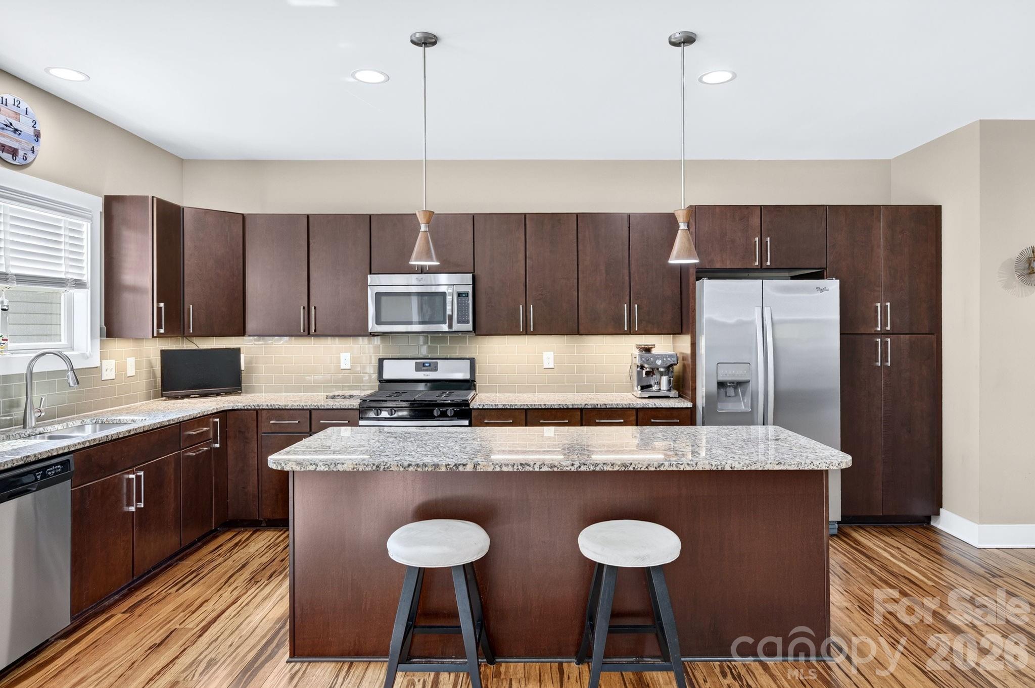 Granite countertops and stainless steel appliances - 10 Meeting Street, Asheville