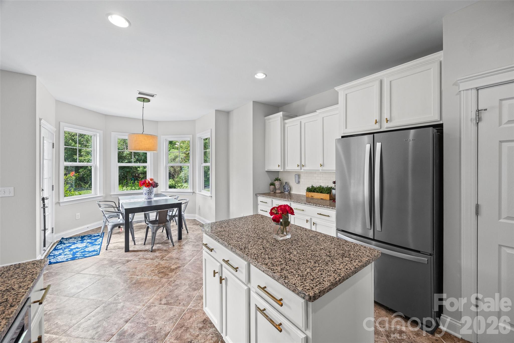 Open, white kitchen - 1037 Fleming Lane, Matthews