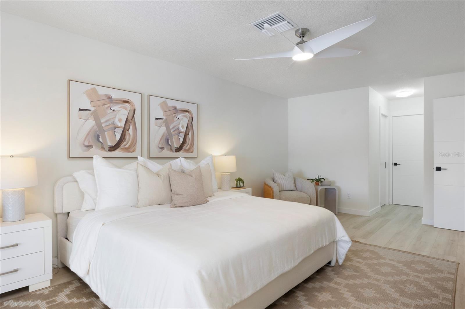 Perfect Place to relax, sitting area, primary suite includes bathroom & walk-in closet by Closets by Design - 382 BOCA CIEGA POINT BLVD S, ST PETERSBURG