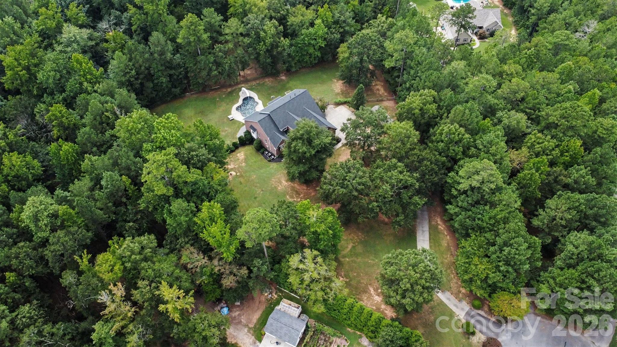 High aerial — “hidden in the trees” - 3647 Venetian Way, York