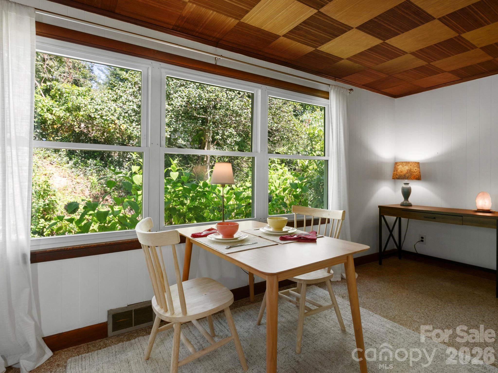 Private Sunroom serves a Multitude of Purposes, Acting as a Versatile, Light-Filled Extension of your Living Space - 28 Arthur Road, Asheville