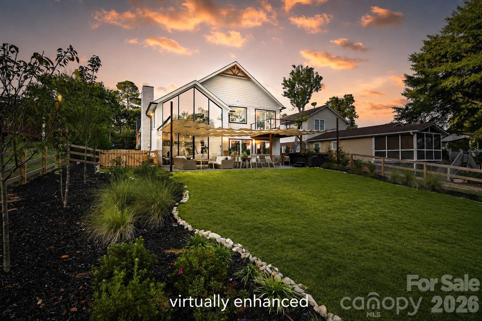 Custom floor to ceiling windows off great room. Grass virtually enhanced. - 7834 Green Cove Court, Denver