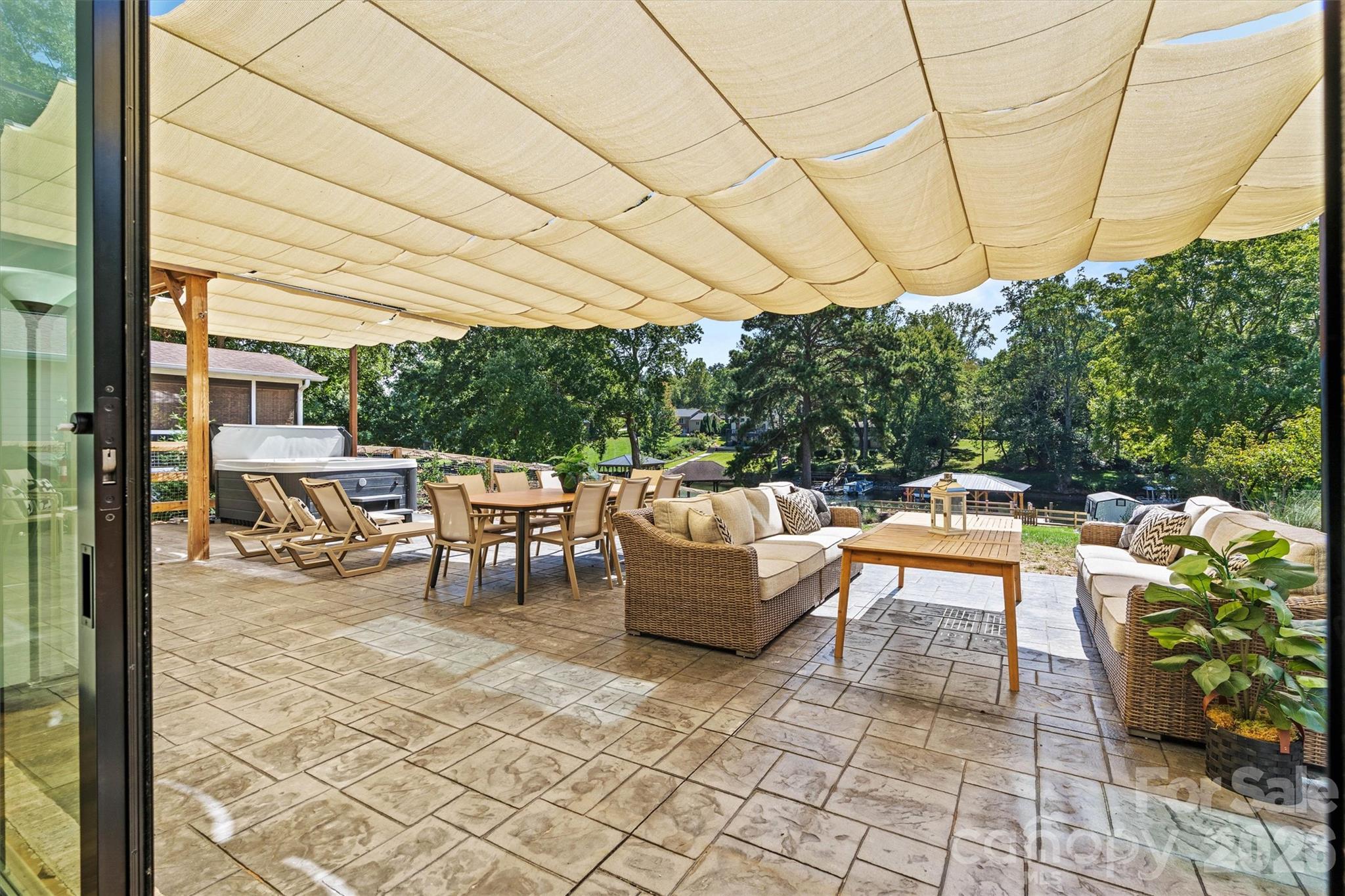Custom, retractable sunshades. - 7834 Green Cove Court, Denver
