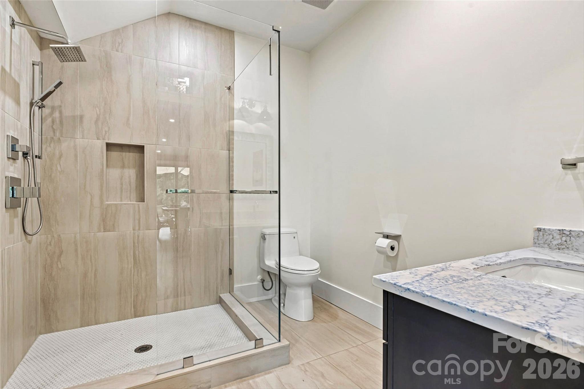 Lower level bath 3 off game room. - 7834 Green Cove Court, Denver