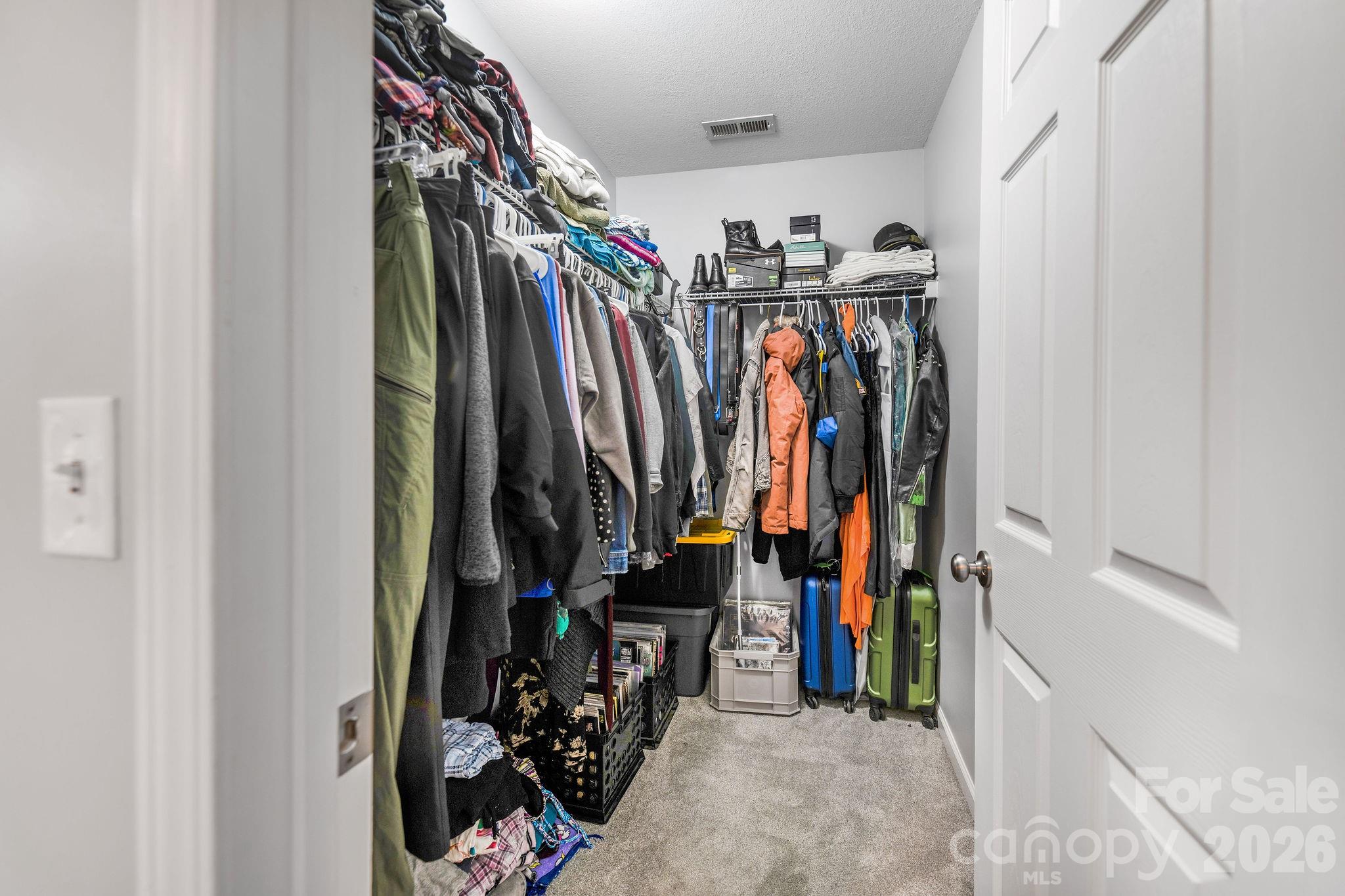Primary walk in closet - 19 Oakcrest Place, Asheville