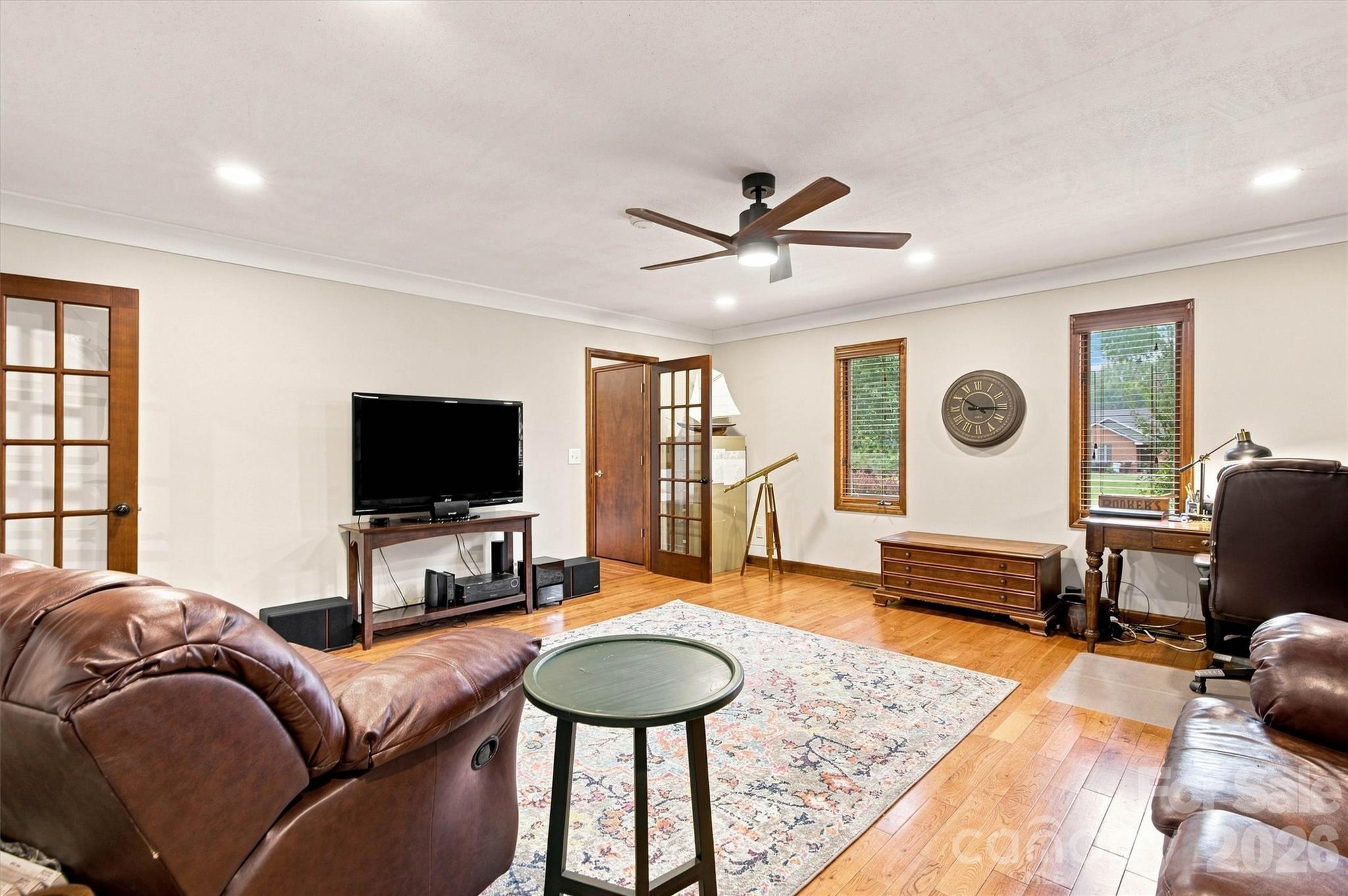 This versatile bonus room, currently utilized as an office/den, offers the flexibility to serve as the perfect space to suit your specific needs. - 3867 Angie Drive, Denver