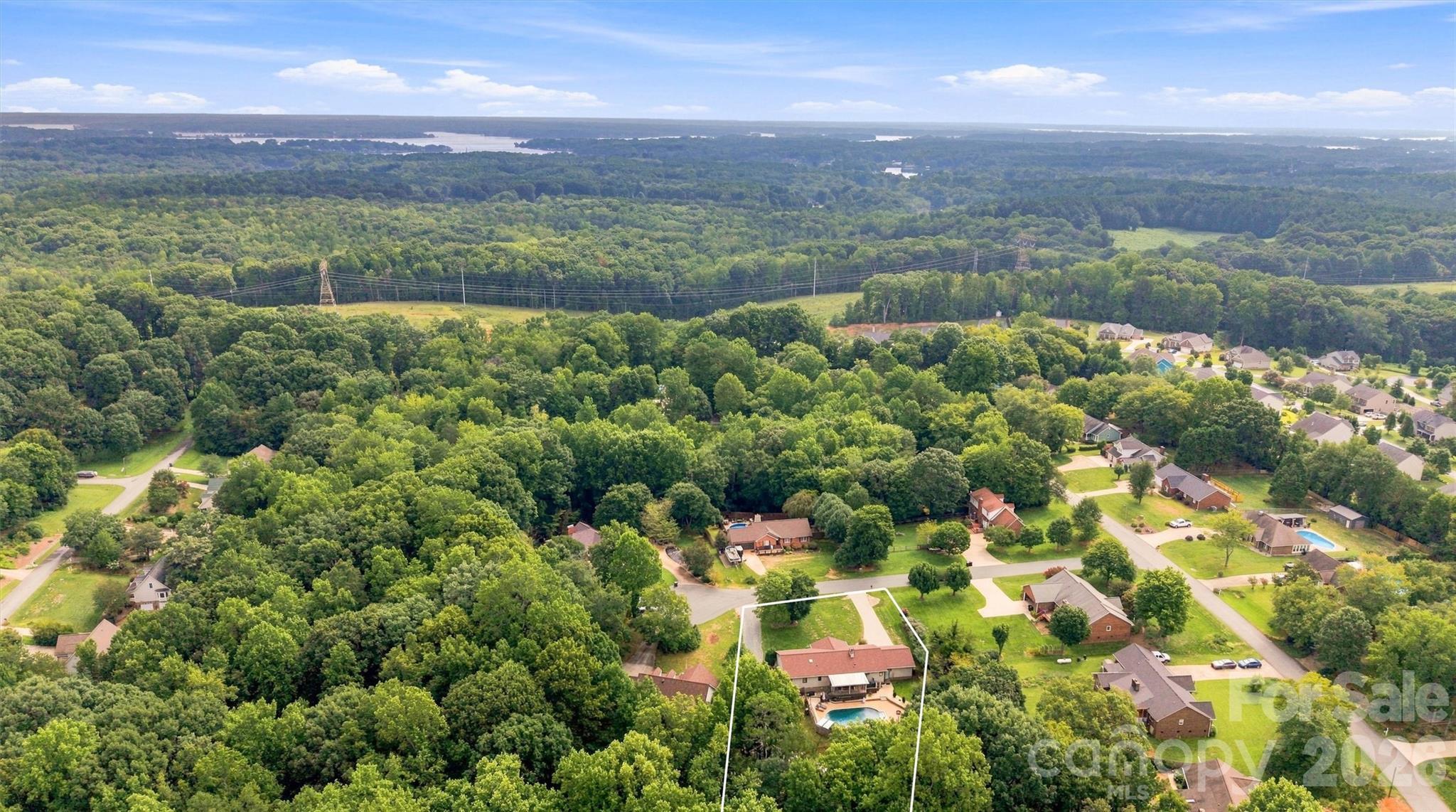 Yes, that is Lake Norman in the background! Home is located 10 minutes from Duke Energy Little Creek public boat access and appx 15 minutes from Duke Energy Pinnacle public boat access. - 3867 Angie Drive, Denver