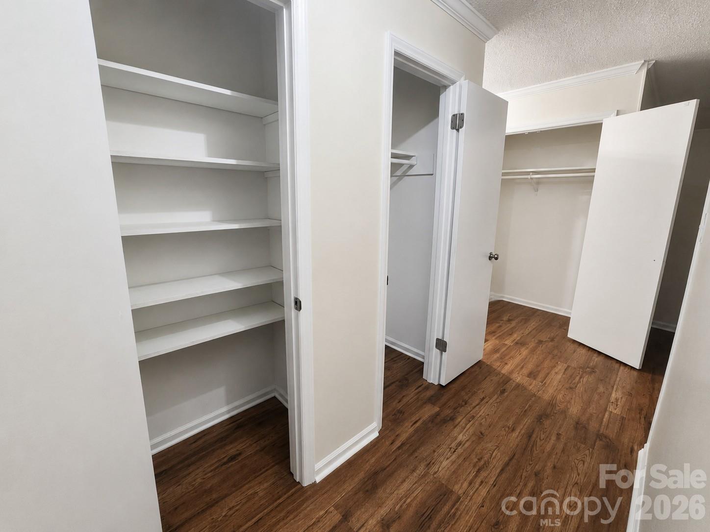 hall closets with doors open to show storage space available - 2914 Dresden Drive, Gastonia