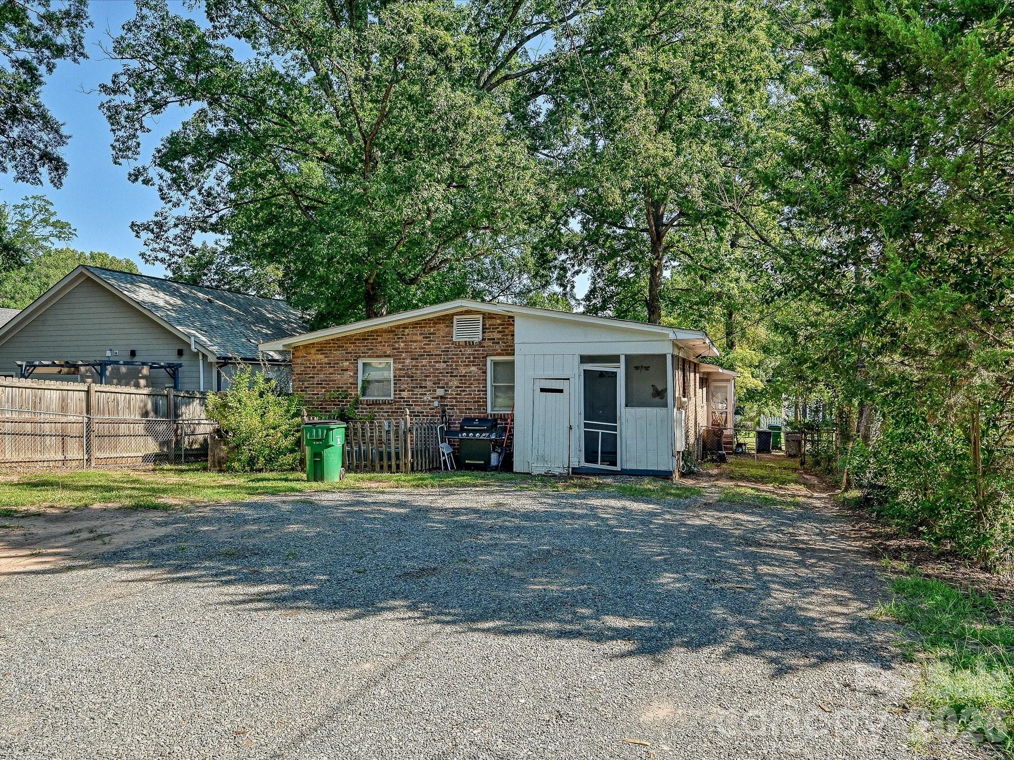 Generous rear lot offers valuable outdoor space and additional potential for Charlotte investors and builders to explore, subject to zoning and applicable approvals. - 305 Keswick Avenue, Charlotte
