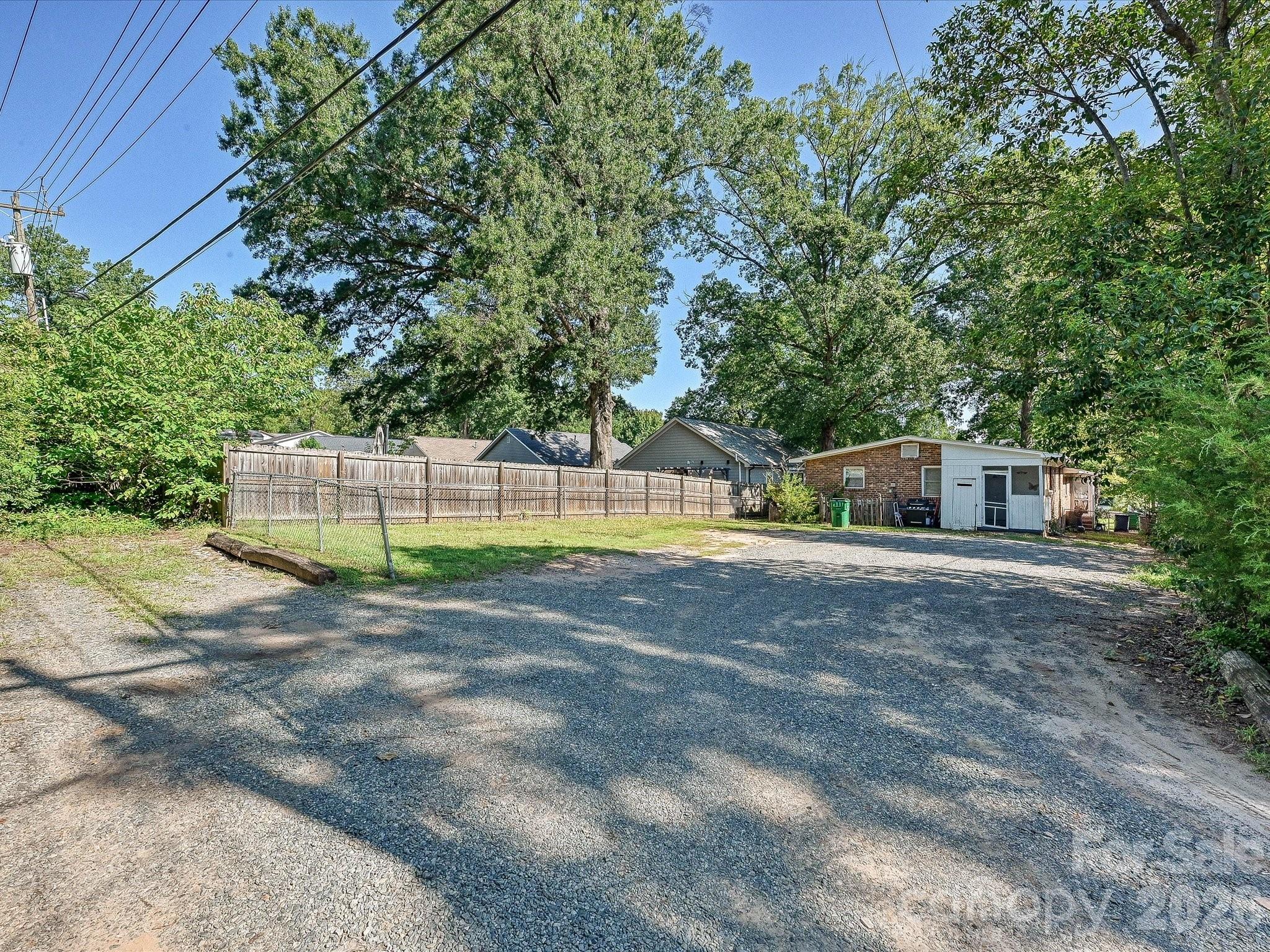 Generous rear lot offers valuable outdoor space and additional potential for Charlotte investors and builders to explore, subject to zoning and applicable approvals. - 305 Keswick Avenue, Charlotte