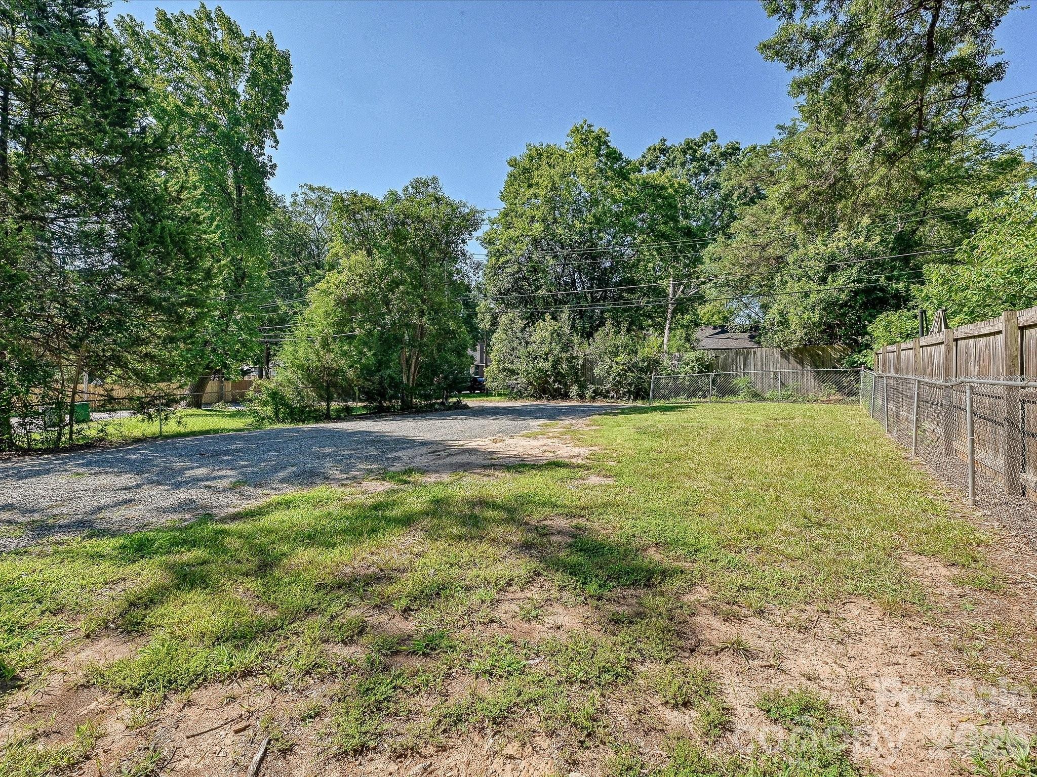 Generous rear lot offers valuable outdoor space and additional potential for Charlotte investors and builders to explore, subject to zoning and applicable approvals. - 305 Keswick Avenue, Charlotte