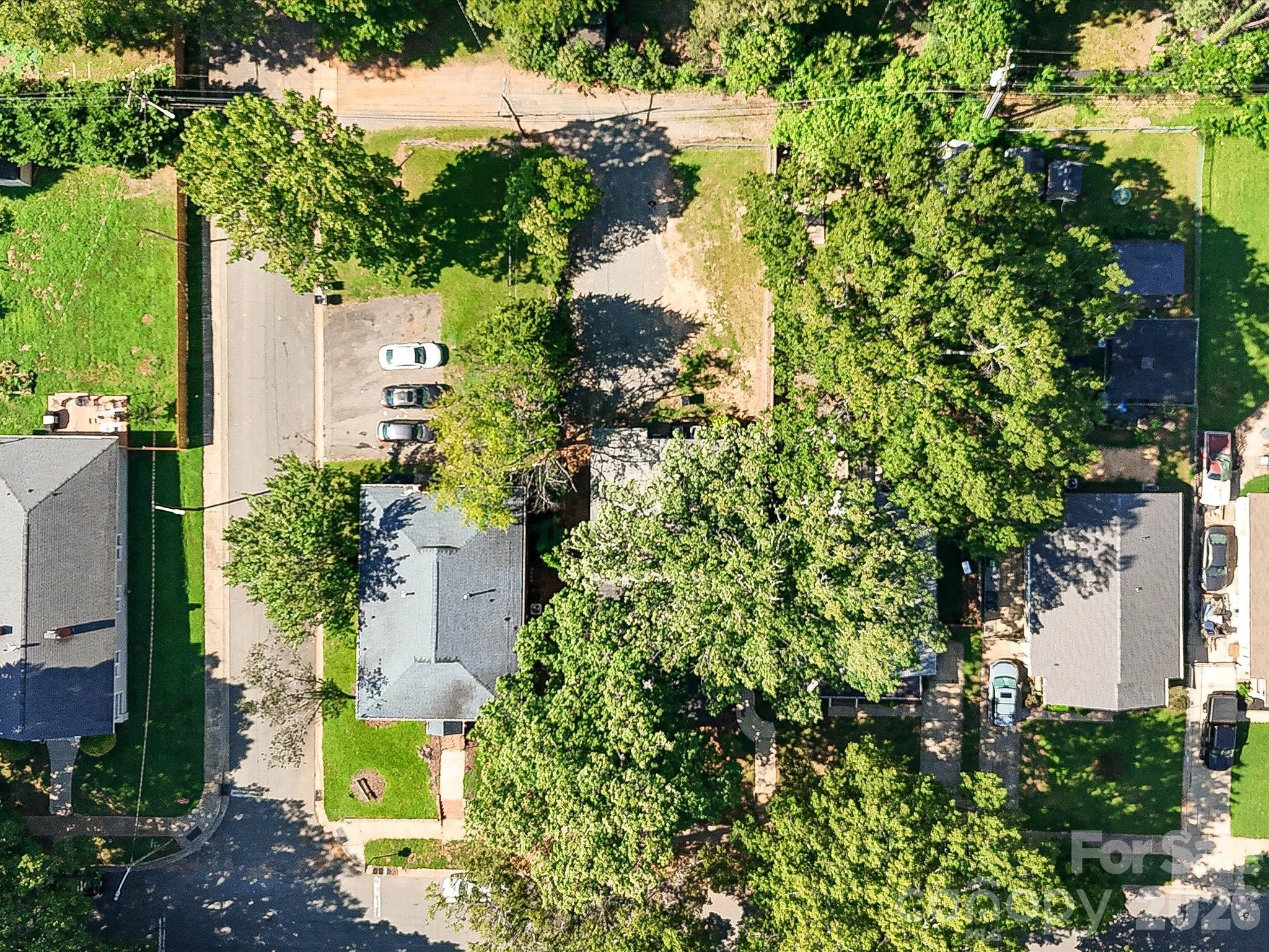 Prime Charlotte real estate opportunity with a deep lot offering exciting potential for investors, redevelopment, or future new construction. - 305 Keswick Avenue, Charlotte
