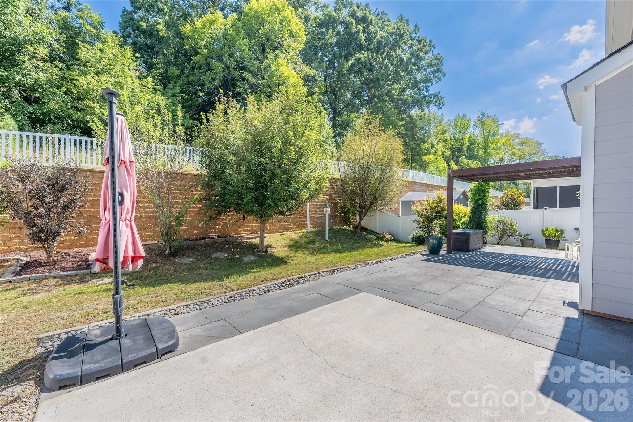 Private backyard with extended patio - 144 Chance Road, Mooresville