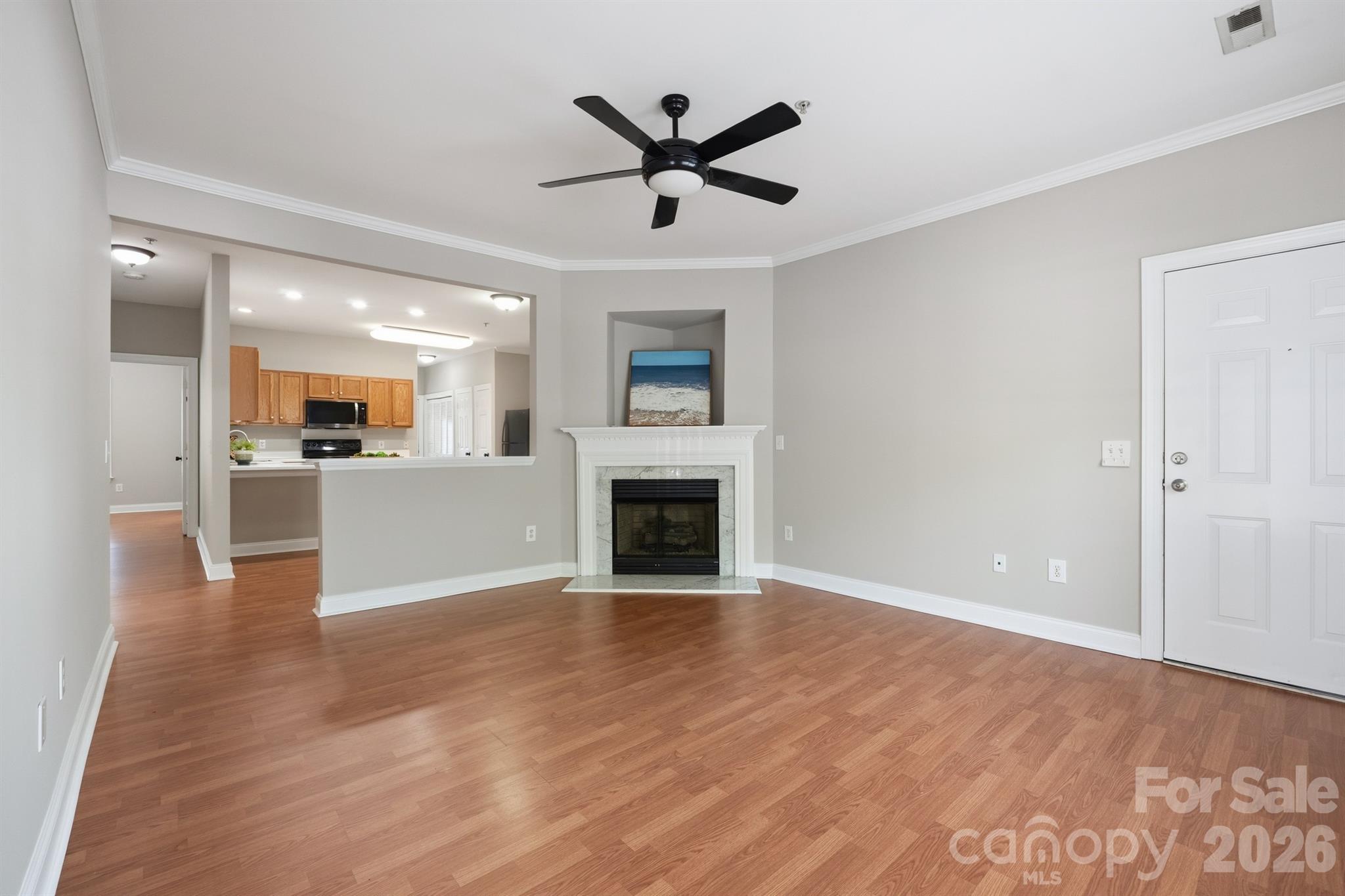 New lighting and paint throughout including this Great room with fireplace - 21246 Hickory Street, Cornelius