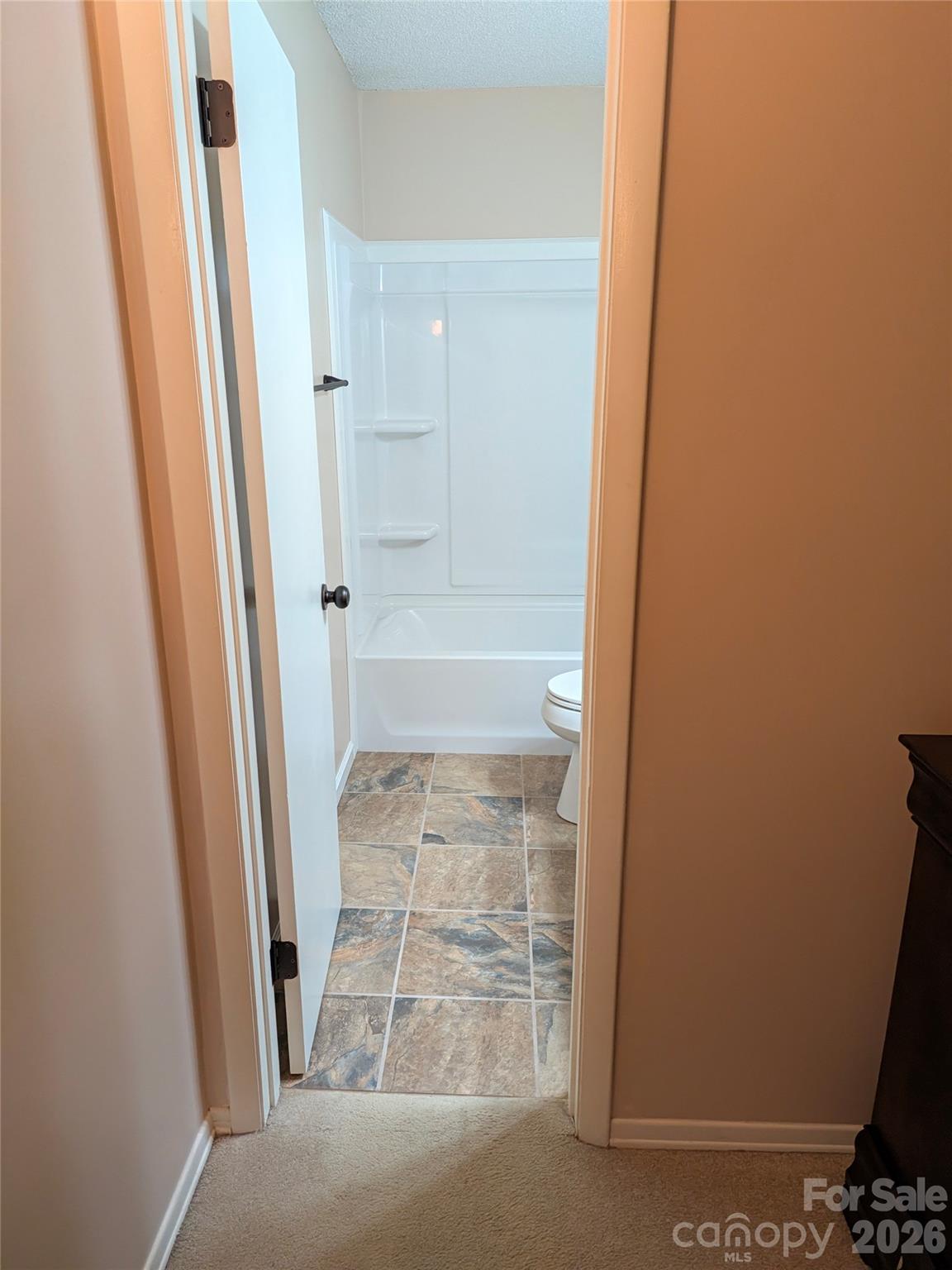 Primary Bathroom with New Floor and Shower - 204 Scottlynn Drive, Asheville