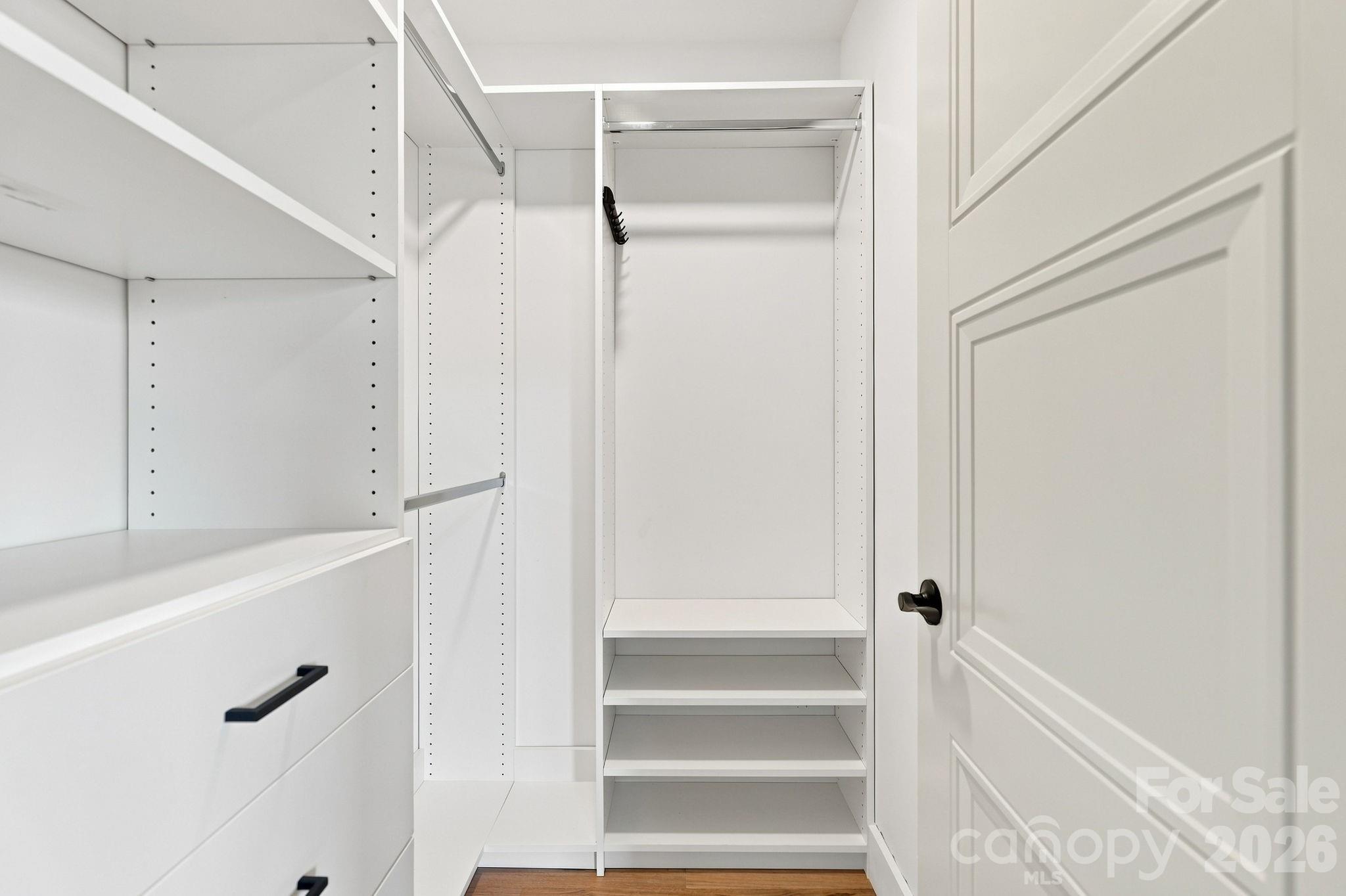 primary closet - 128 Chepstow Place, Black Mountain