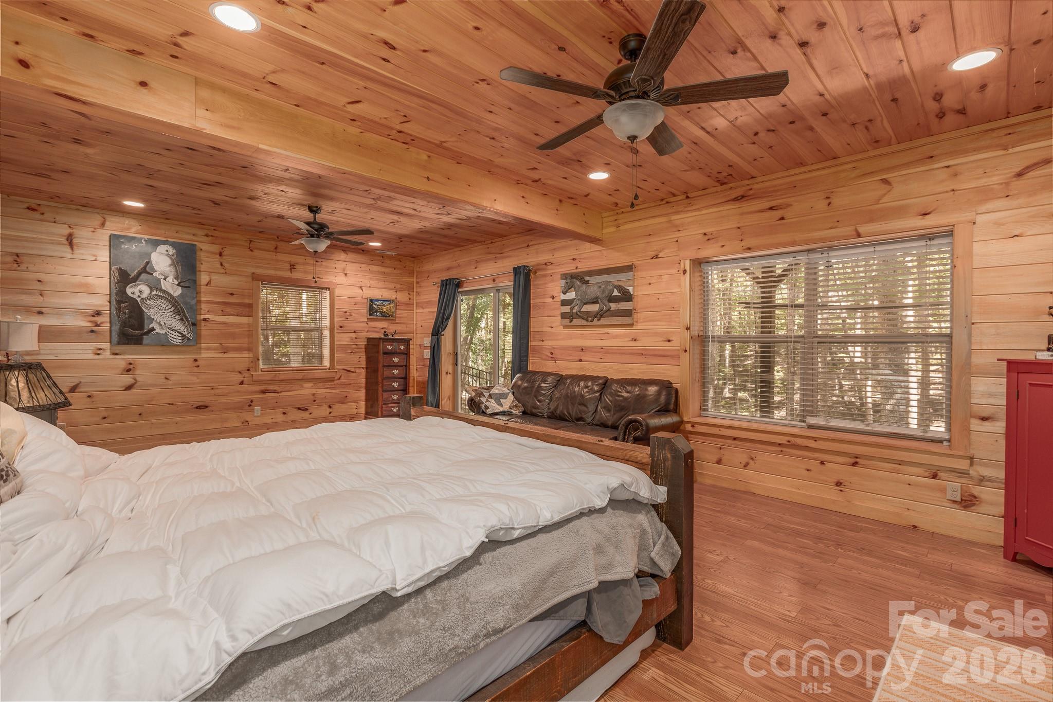 Basement rec room, owner uses as primary bedroom. - 257 Adirondack Trail, Nebo