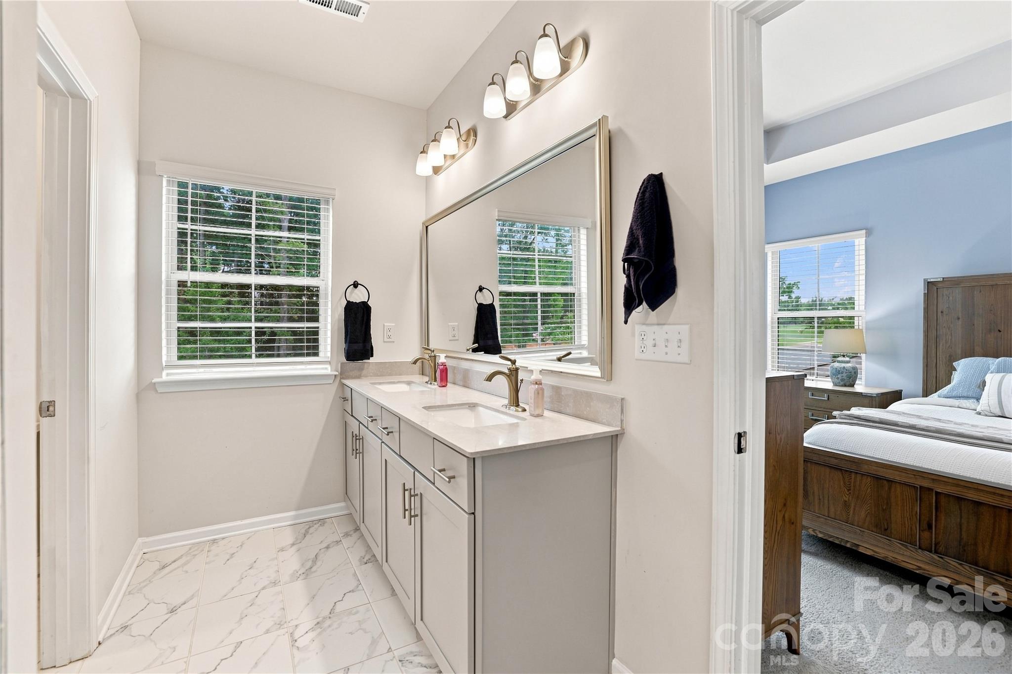 Dual sink vanity in primary bath - 2327 Mount Harmony Ch Road, Matthews