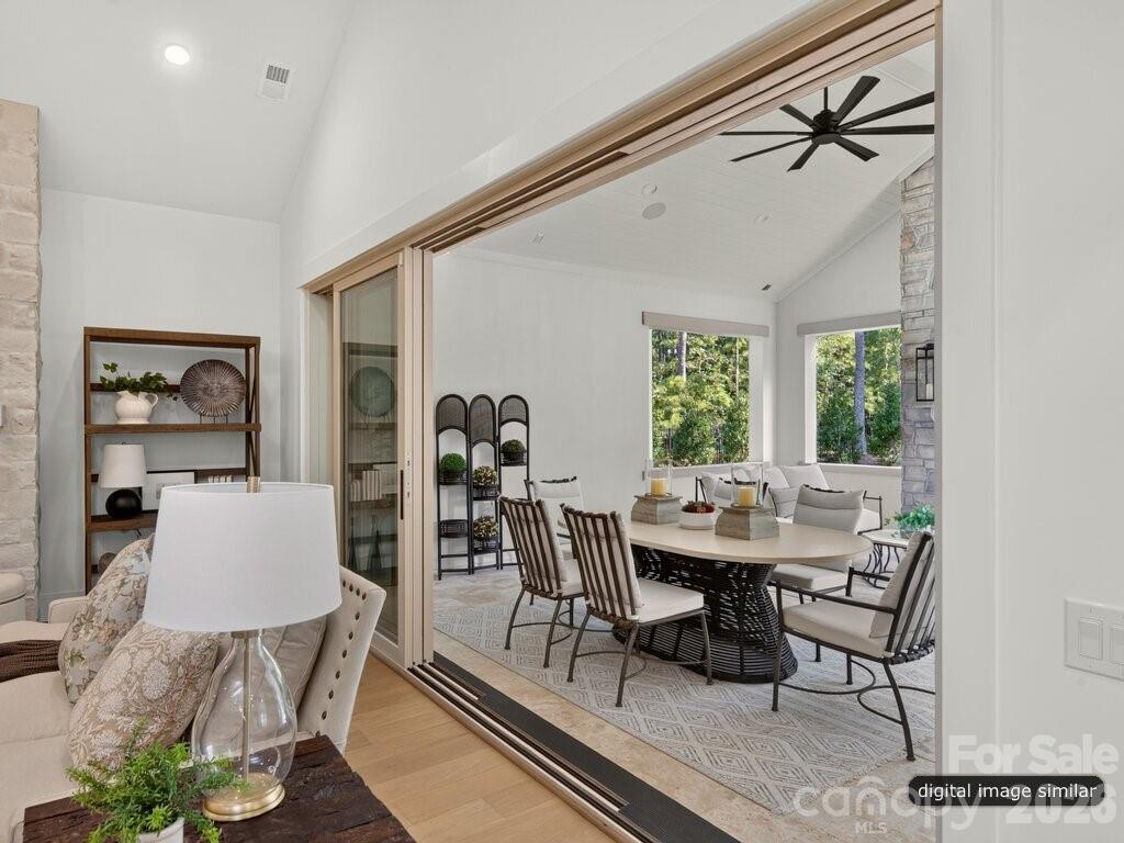 Stacking Doors flow to Covered Outdoor Terrace - 128 Willow View Loop, Davidson