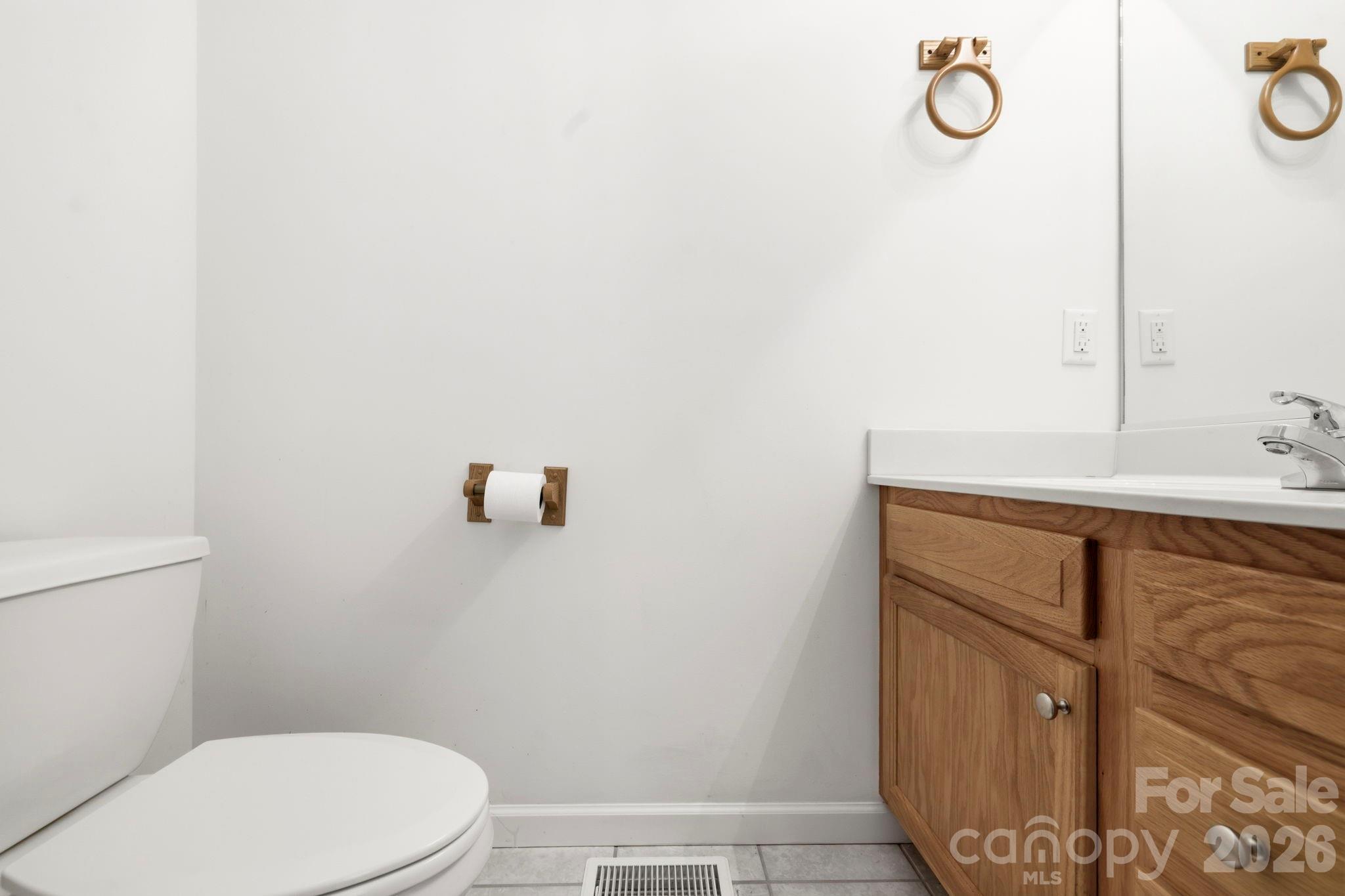 Half bathroom off of the office - 62 Chickwood Trail, Weaverville