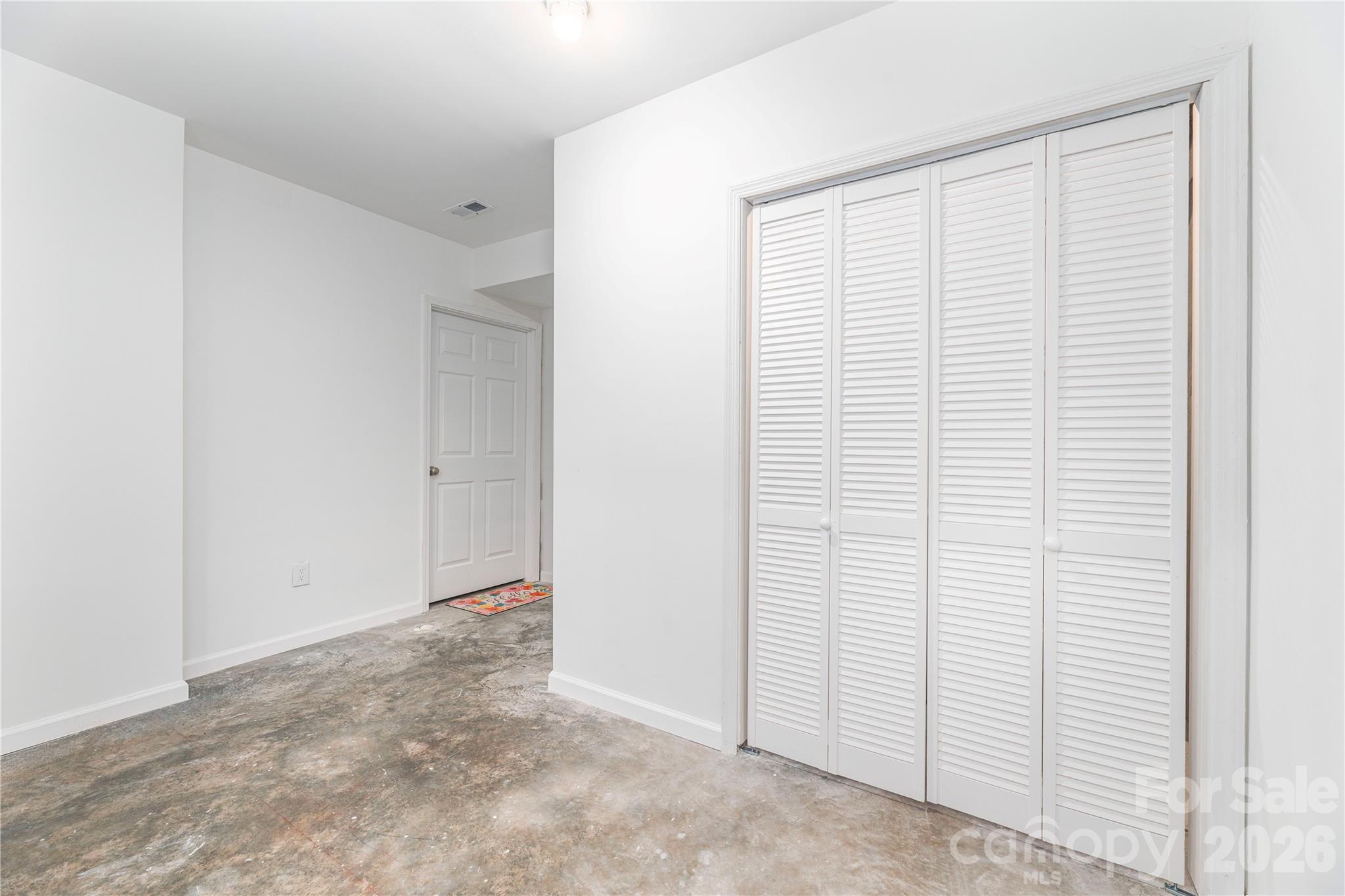 Lower Level Bonus Room or Workshop with Laundry and Utility Closet - 5 Declan Drive, Weaverville