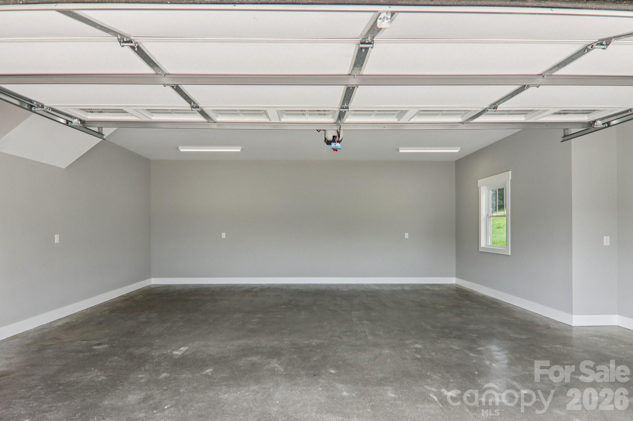 Two car garage. - 1060 California Creek Road, Mars Hill