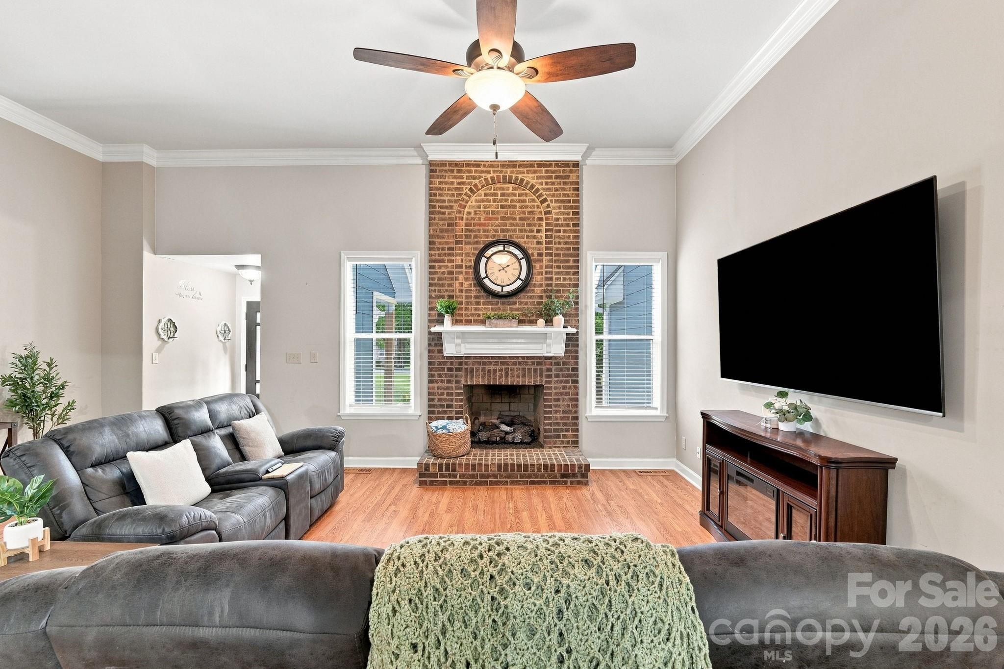 Great Room with Dramatic Floor-to-Ceiling Brick Fireplace - 106 Webbed Foot Road, Mooresville