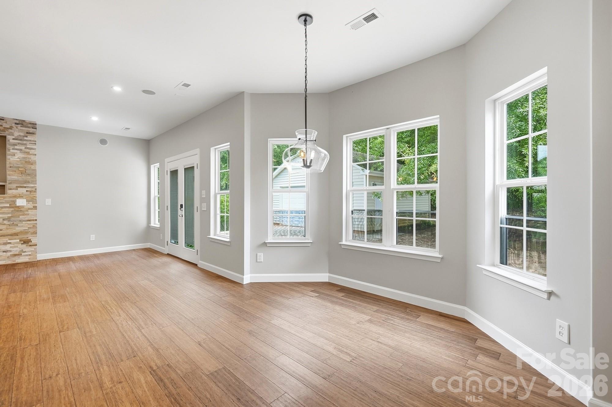 Handscraped Bamboo flooring throughout the first floor - 11402 Heritage Green Drive, Cornelius