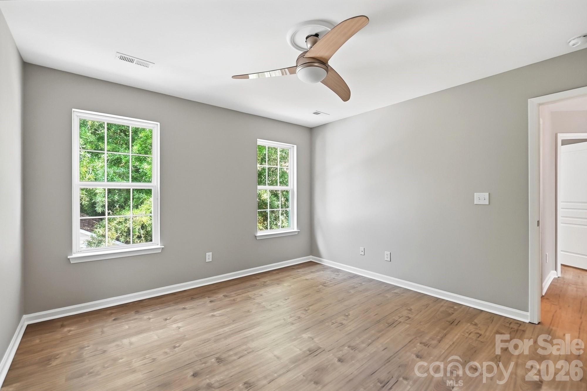 Primary Bedroom overlooks the backyard - 11402 Heritage Green Drive, Cornelius