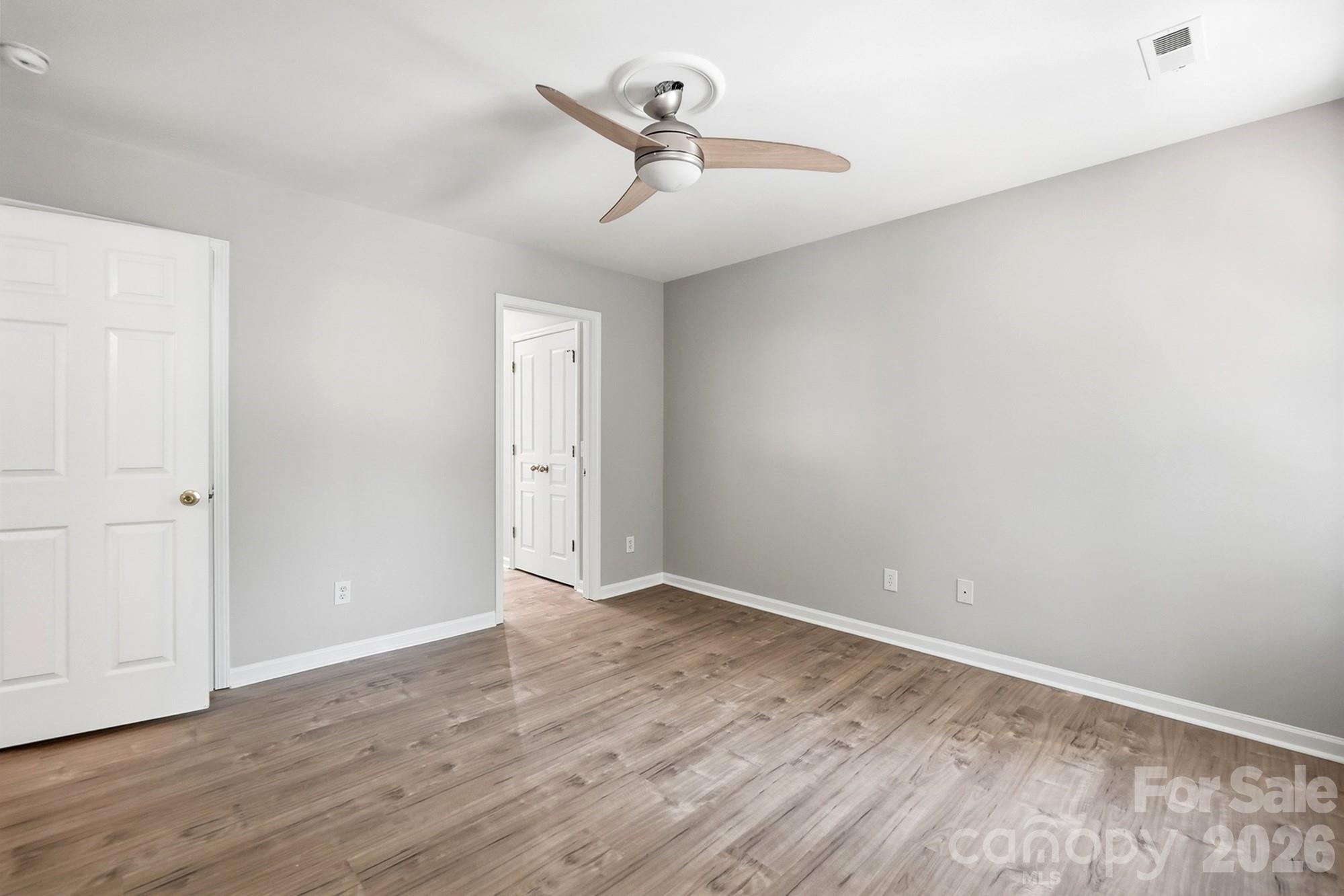 Primary bedroom has 2 walk-in closets - 11402 Heritage Green Drive, Cornelius