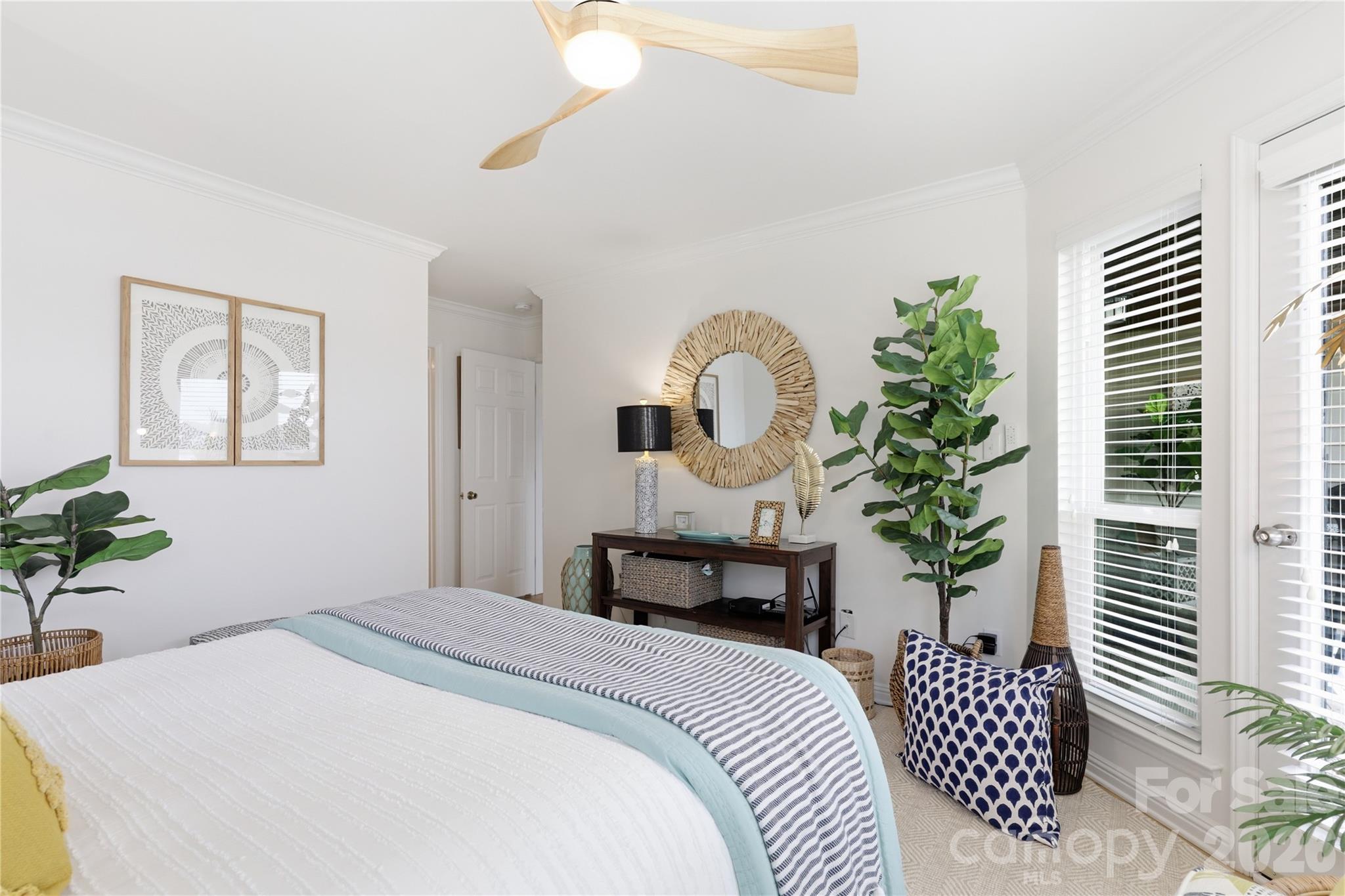 Primary Bedroom, private bath, private access to lakeside balcony and lake views. - 932 Southwest Drive, Davidson