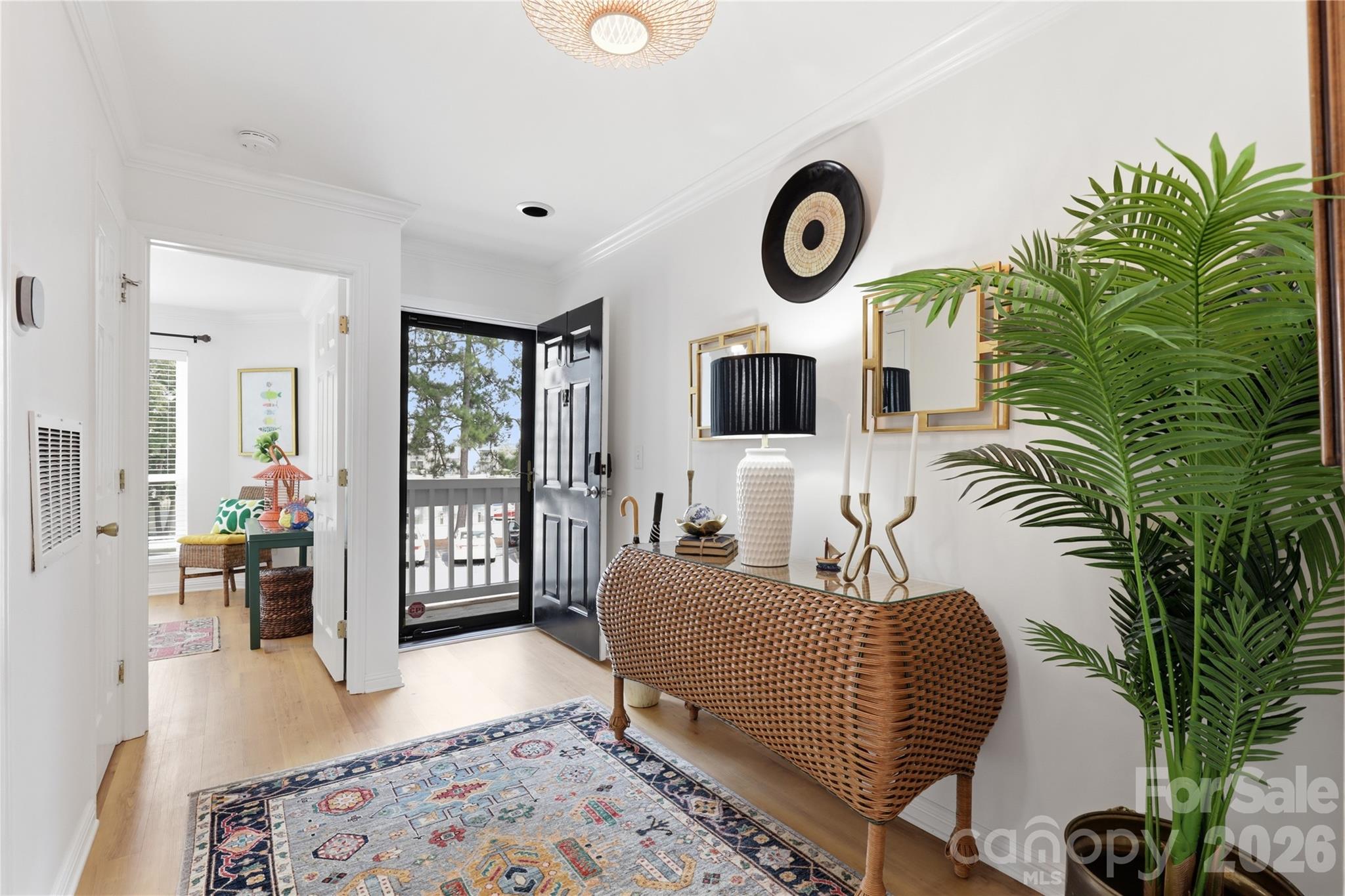 Open connection between the living and dining areas. - 932 Southwest Drive, Davidson